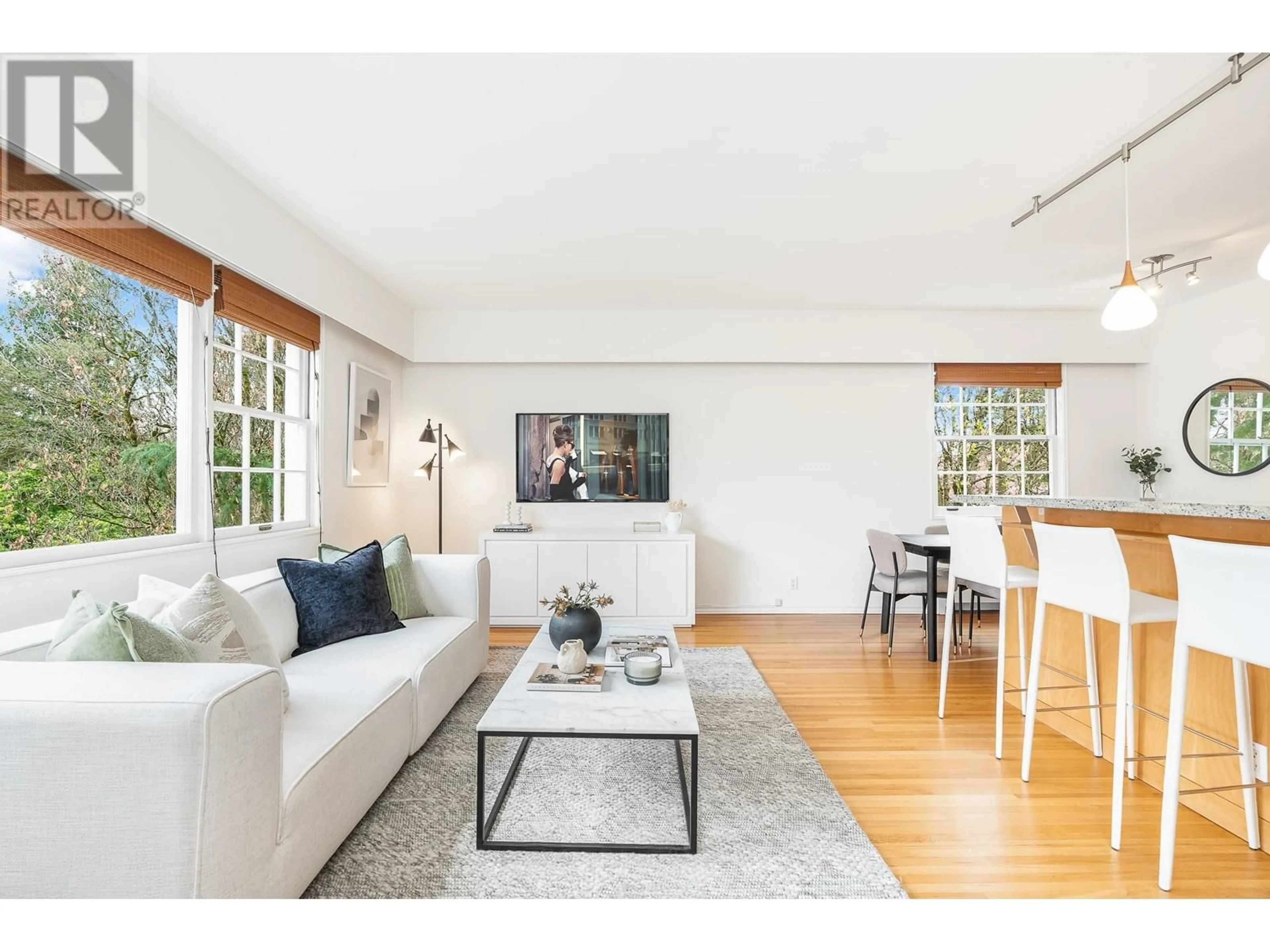 Living room with furniture, wood/laminate floor for 320 - 2890 POINT GREY ROAD, Vancouver British Columbia V6K1A9
