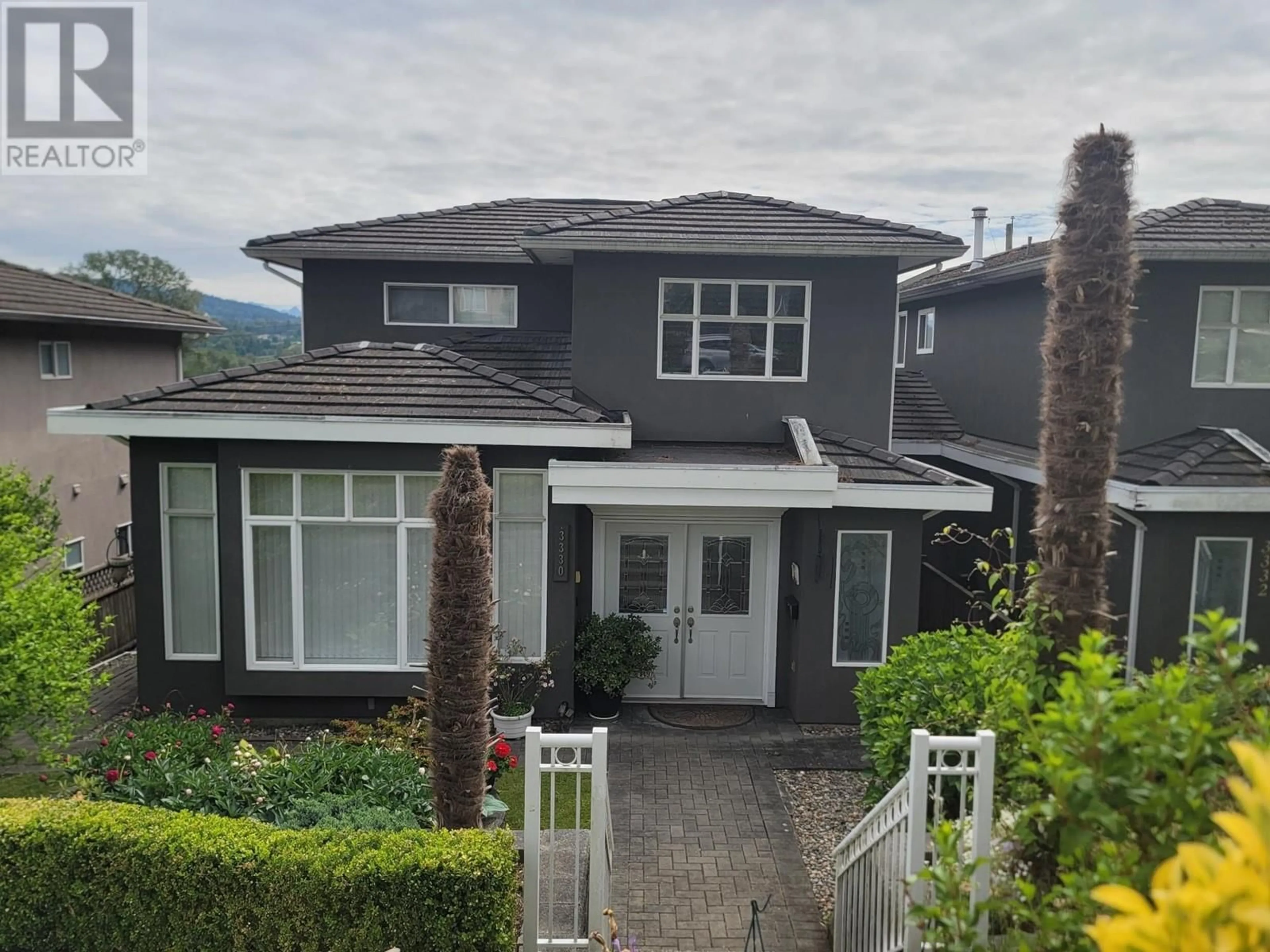 A pic from outside/outdoor area/front of a property/back of a property/a pic from drone, mountain view for 3330 DOUGLAS ROAD, Burnaby British Columbia V5G3N9
