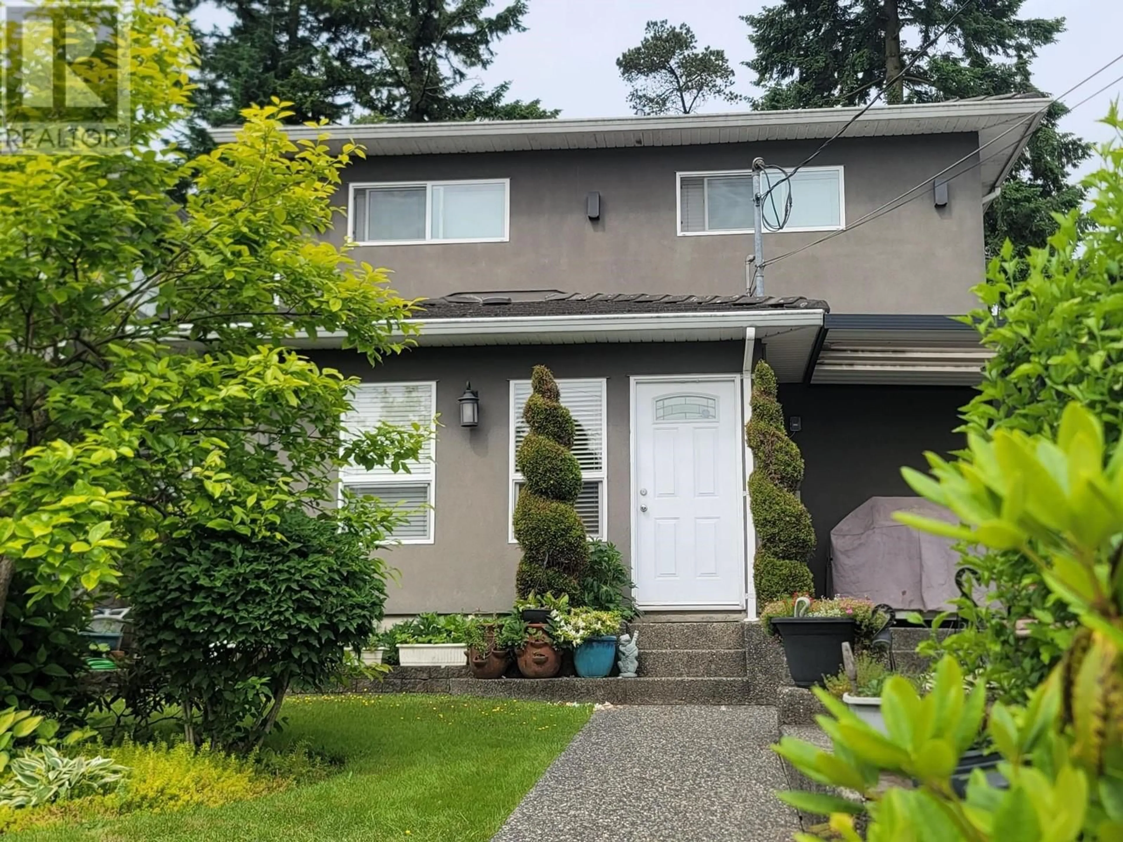 Home with vinyl exterior material, street for 3330 DOUGLAS ROAD, Burnaby British Columbia V5G3N9