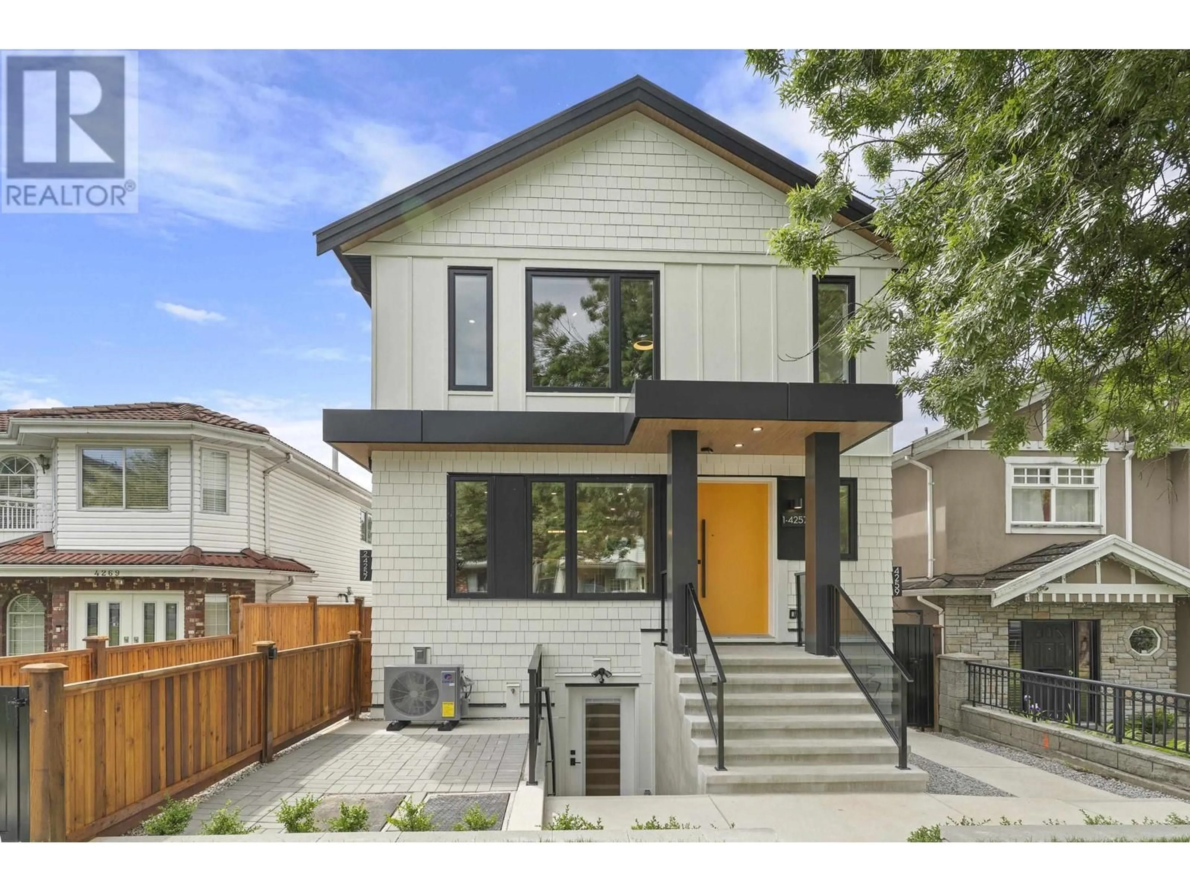 Home with brick exterior material, street for 1 - 4257 BEATRICE STREET, Vancouver British Columbia V5N4H9