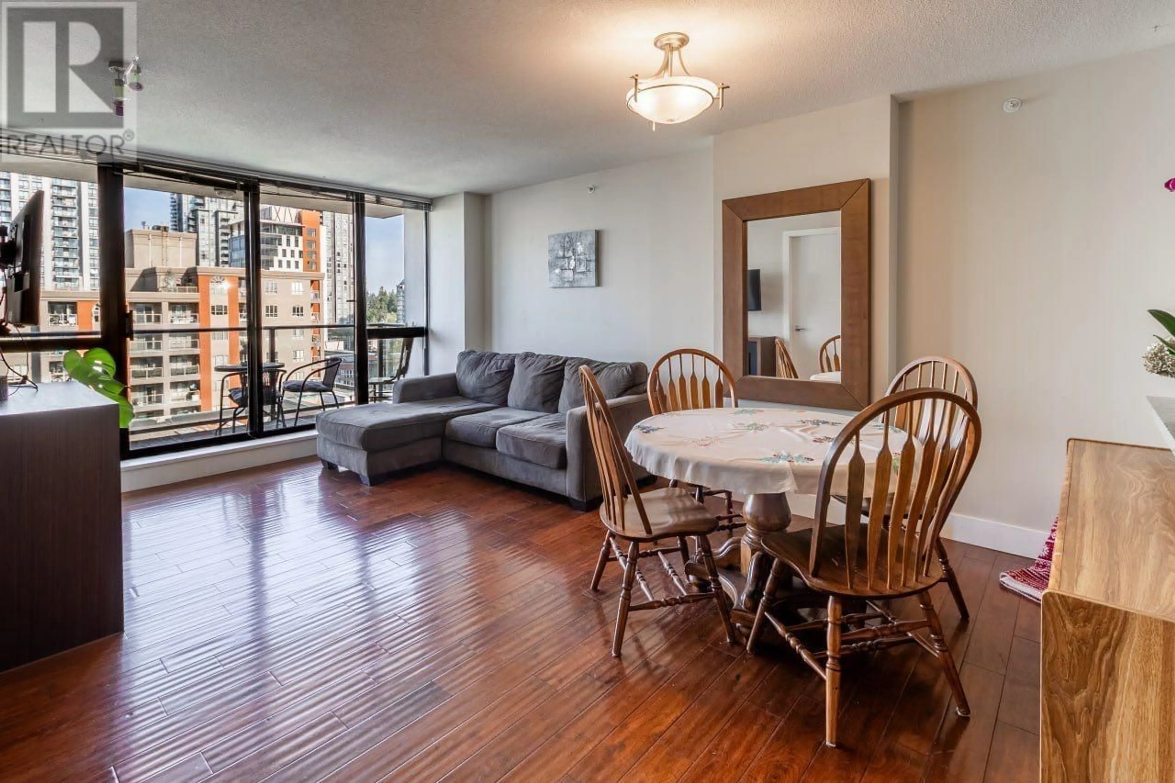 Living room with furniture, wood/laminate floor for 1103 - 2959 GLEN DRIVE, Coquitlam British Columbia V3B0B8