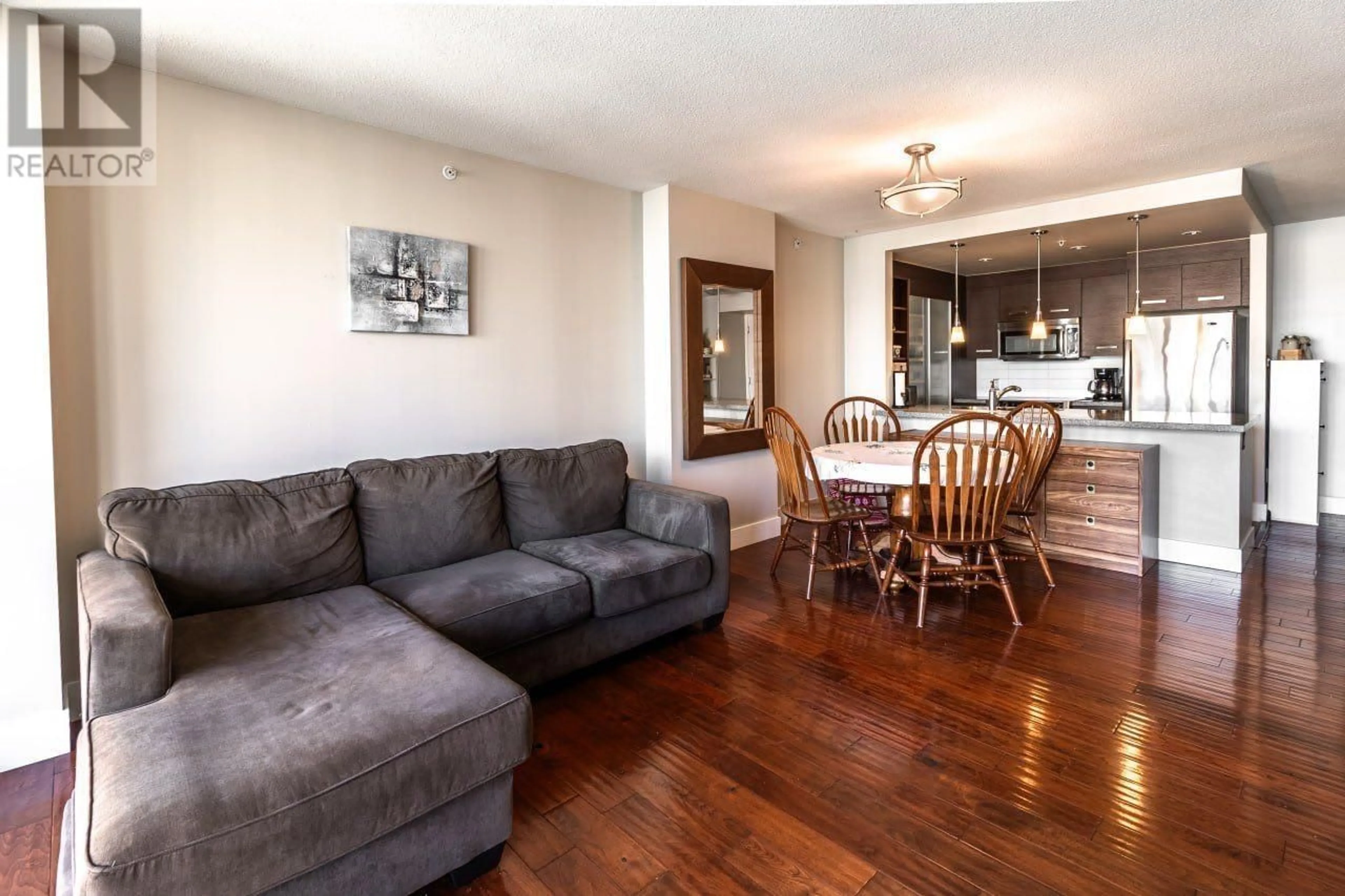 Living room with furniture, wood/laminate floor for 1103 - 2959 GLEN DRIVE, Coquitlam British Columbia V3B0B8