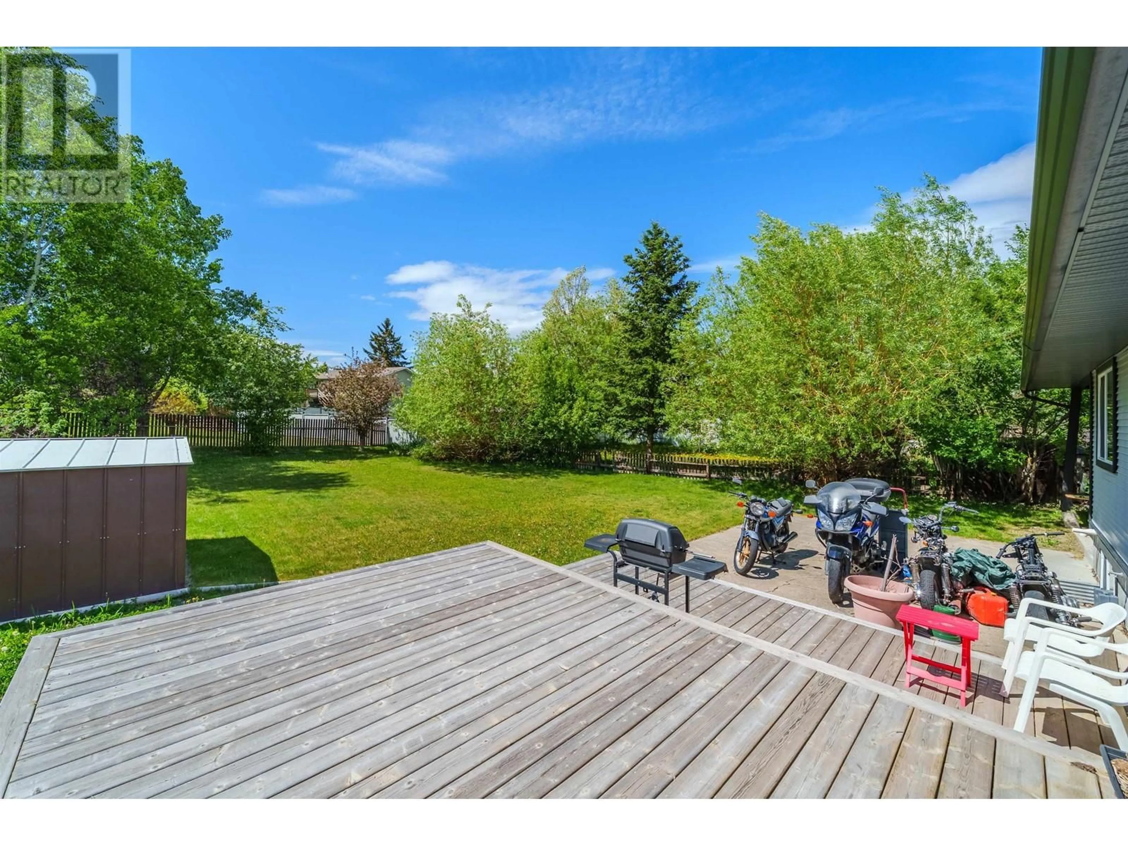 Patio, water/lake/river/ocean view for 488 EVERGREEN CRESCENT, 100 Mile House British Columbia V0K2E0