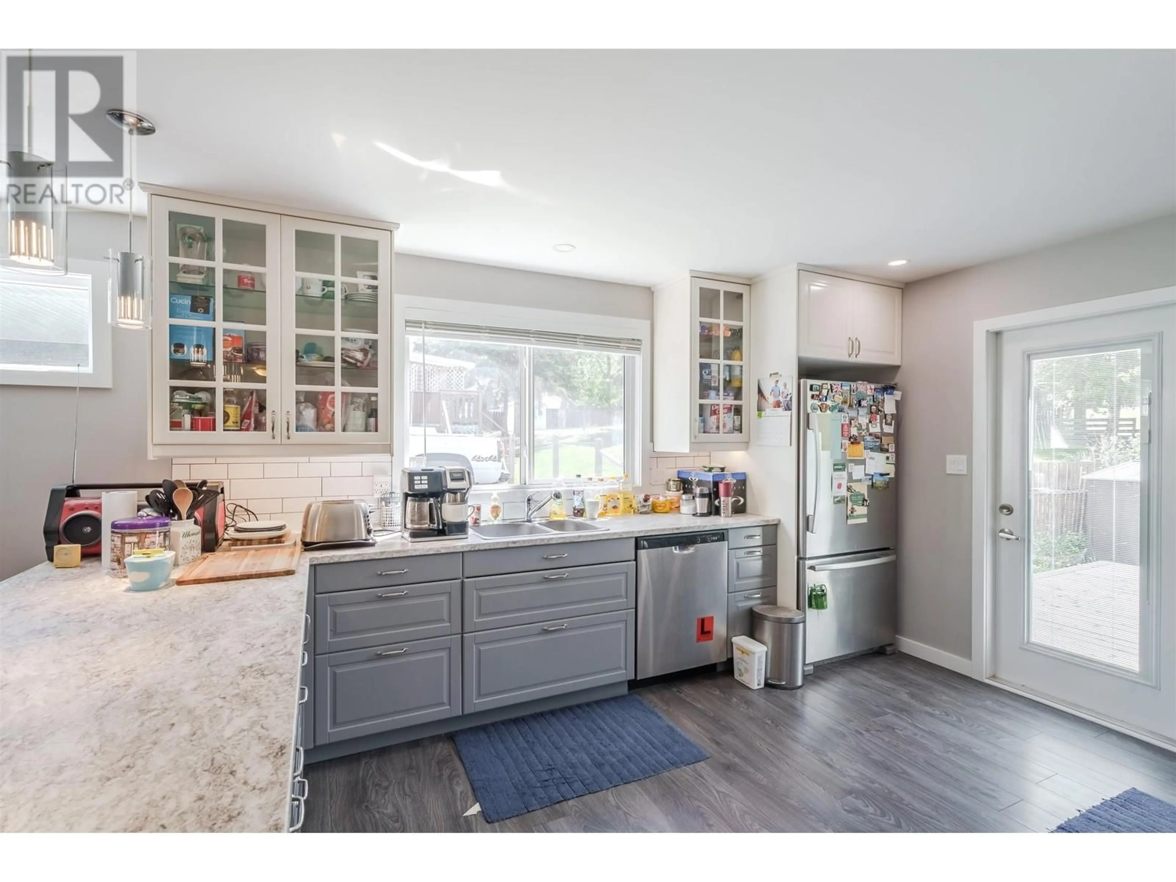 Open concept kitchen, unknown for 488 EVERGREEN CRESCENT, 100 Mile House British Columbia V0K2E0