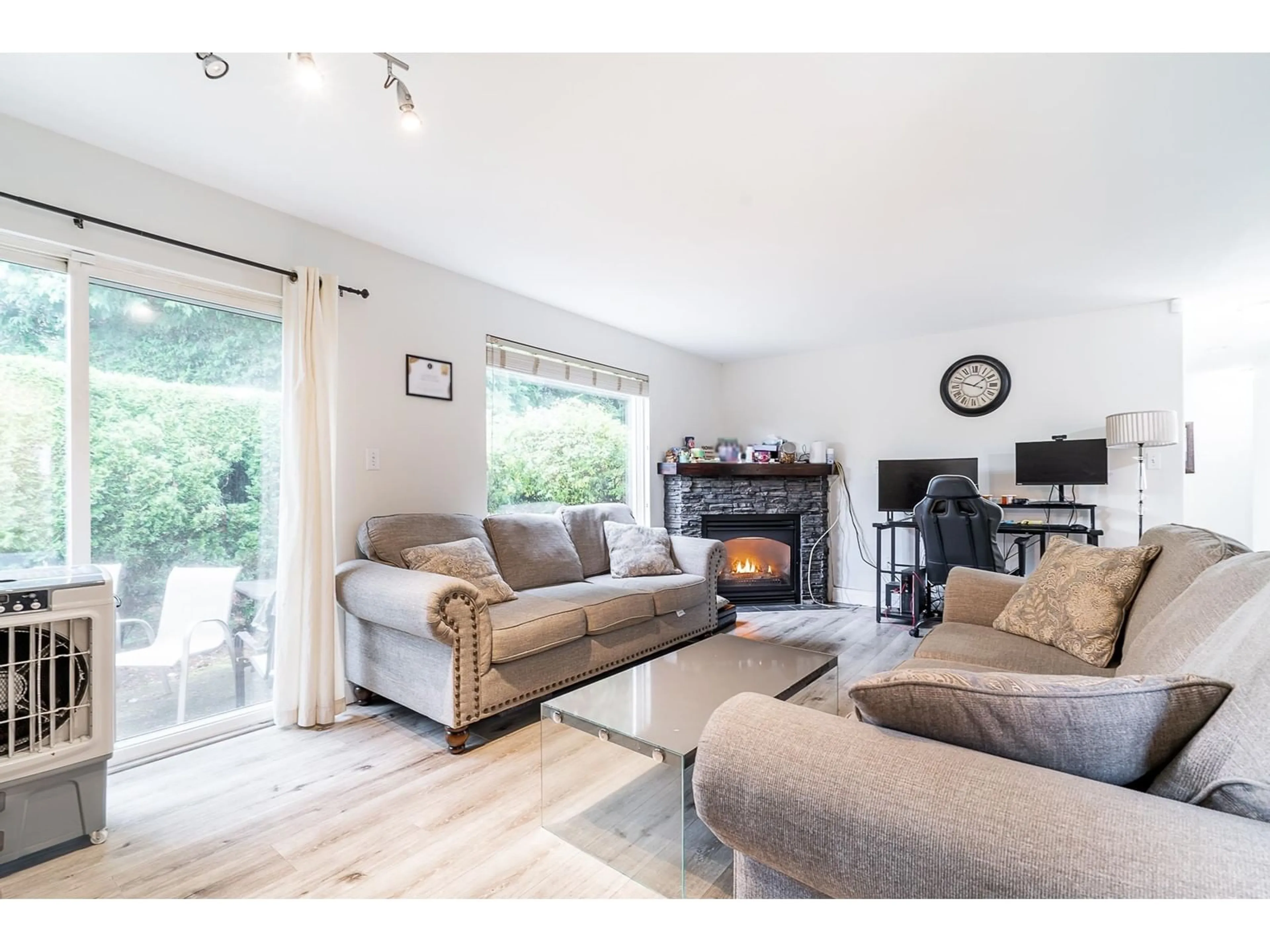 Living room with furniture, wood/laminate floor for 29 - 34332 MACLURE, Abbotsford British Columbia V2S7S8