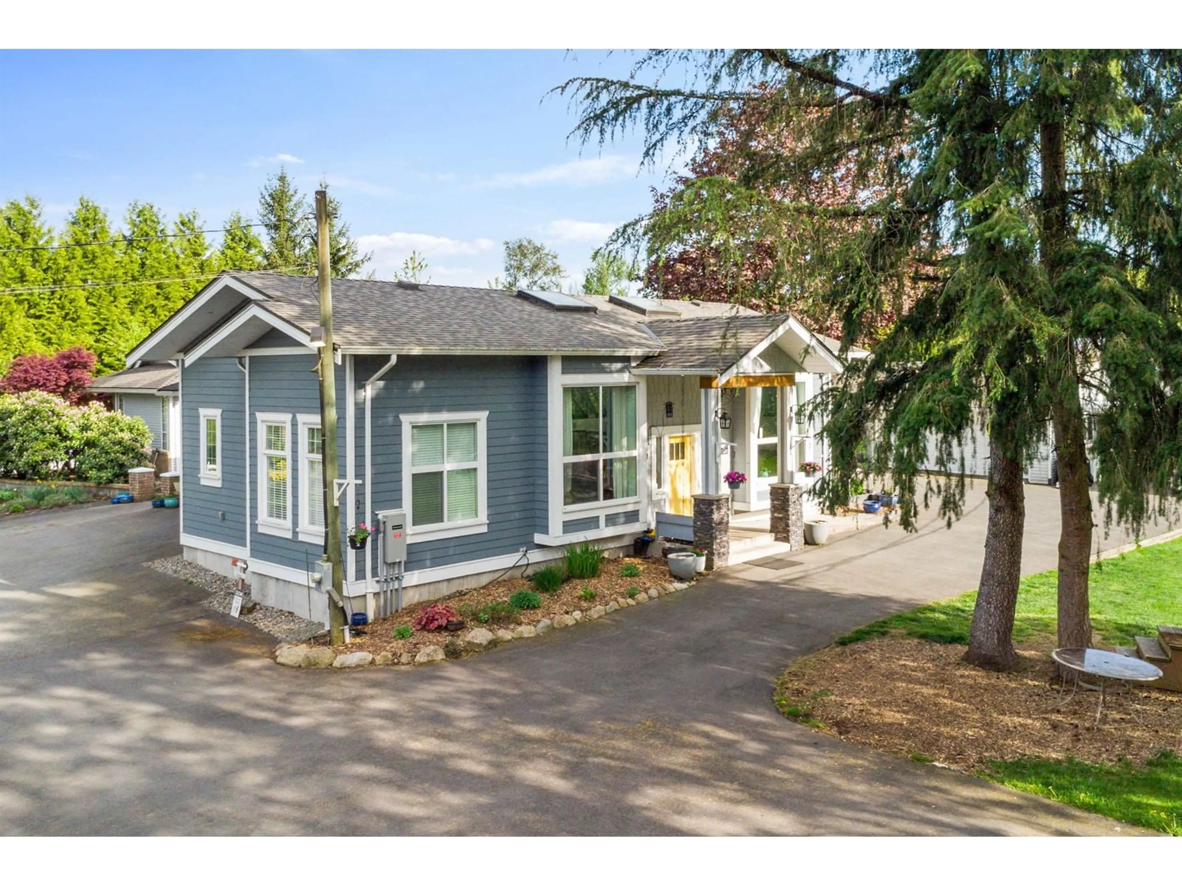 Home with vinyl exterior material, street for 6063 256, Langley British Columbia V4W1K1