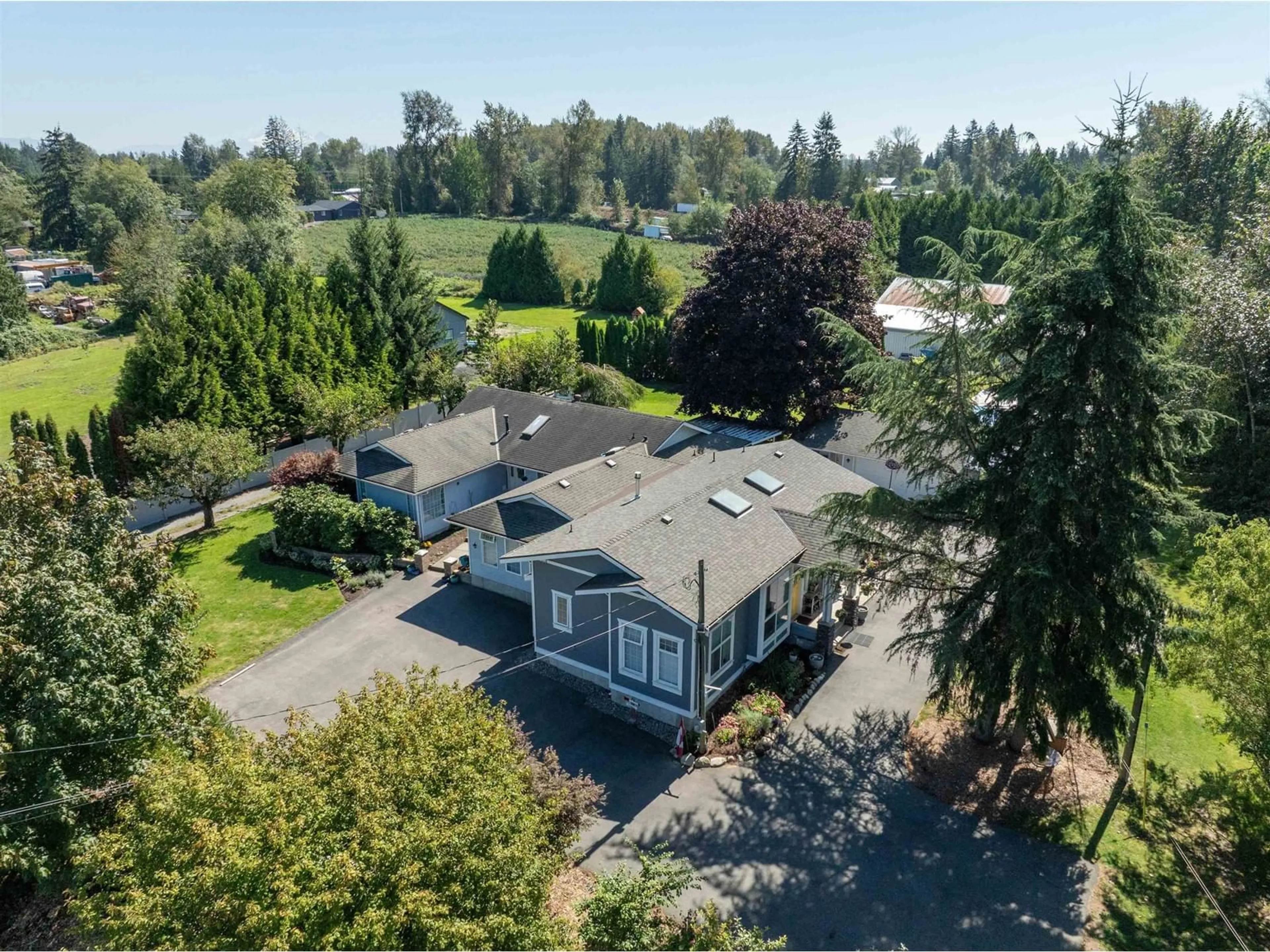 A pic from outside/outdoor area/front of a property/back of a property/a pic from drone, unknown for 6063 256, Langley British Columbia V4W1K1