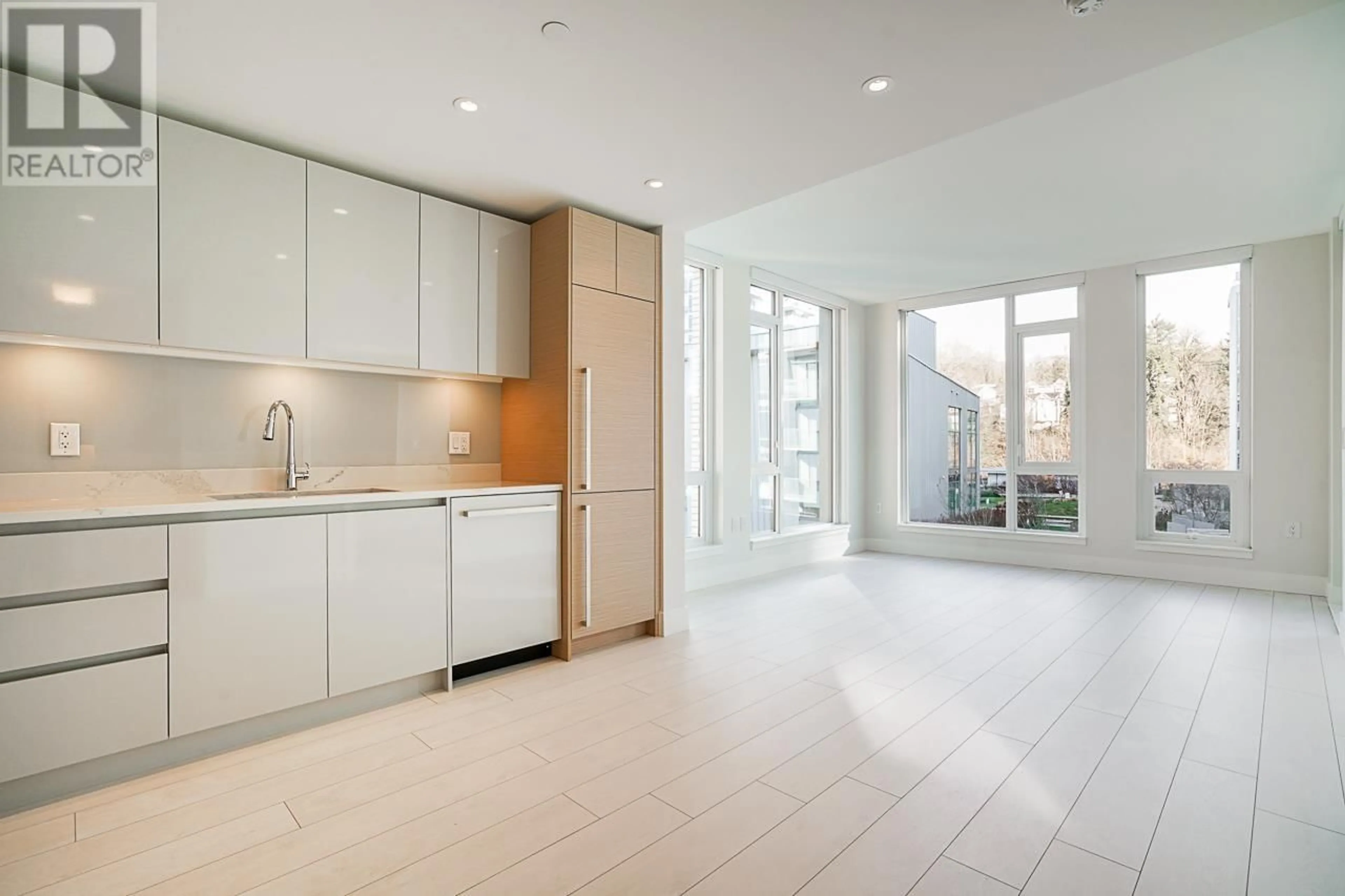 Open concept kitchen, ceramic/tile floor for 504 - 3538 SAWMILL CRESCENT, Vancouver British Columbia V5S0J8