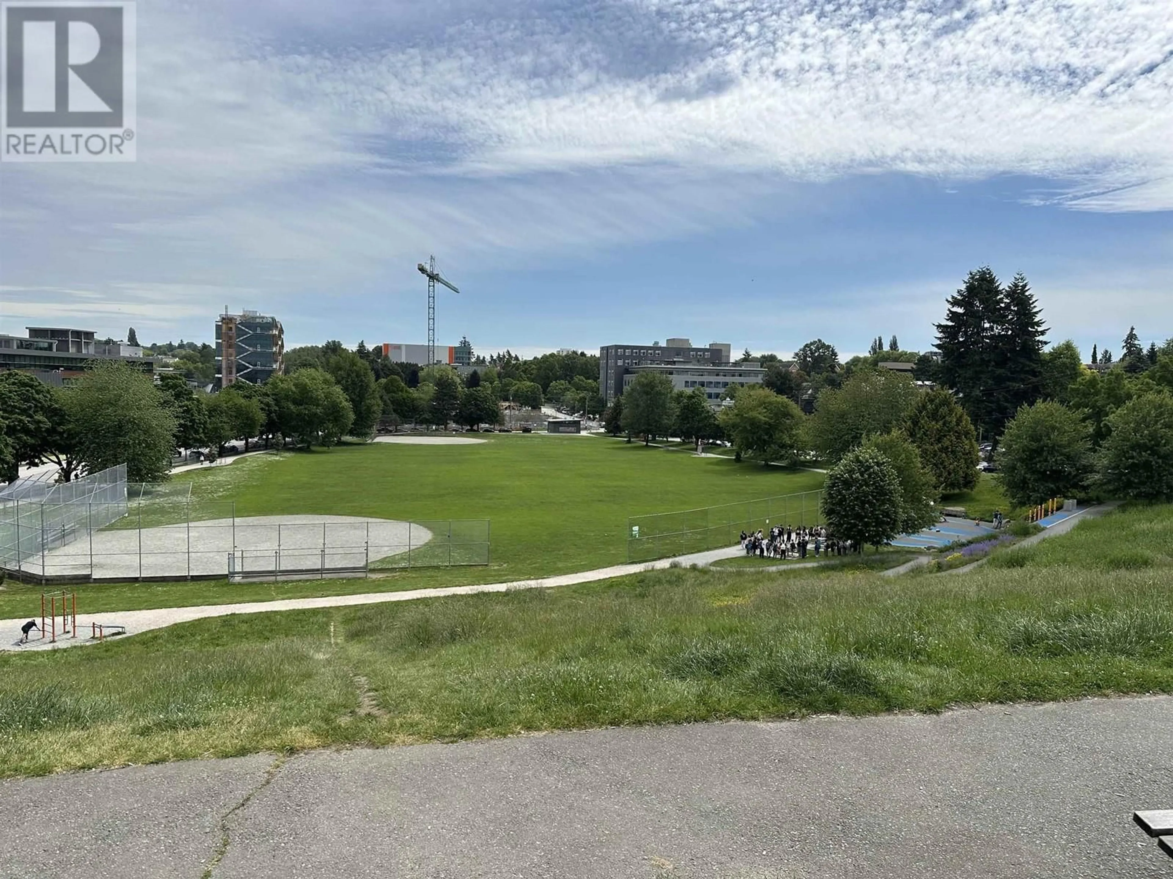A pic from outside/outdoor area/front of a property/back of a property/a pic from drone, unknown for 306 - 2234 PRINCE ALBERT STREET, Vancouver British Columbia V5T4K9