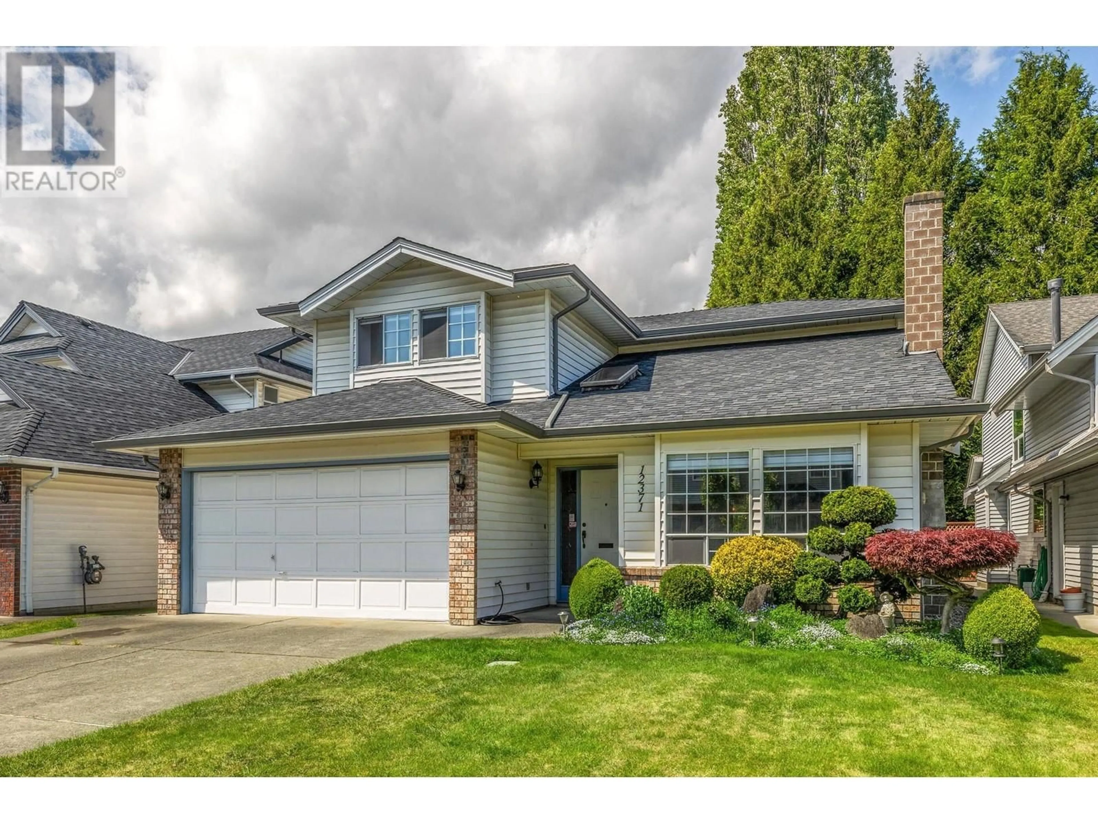 Home with vinyl exterior material, street for 12371 GREENLAND DRIVE, Richmond British Columbia V6V2A7