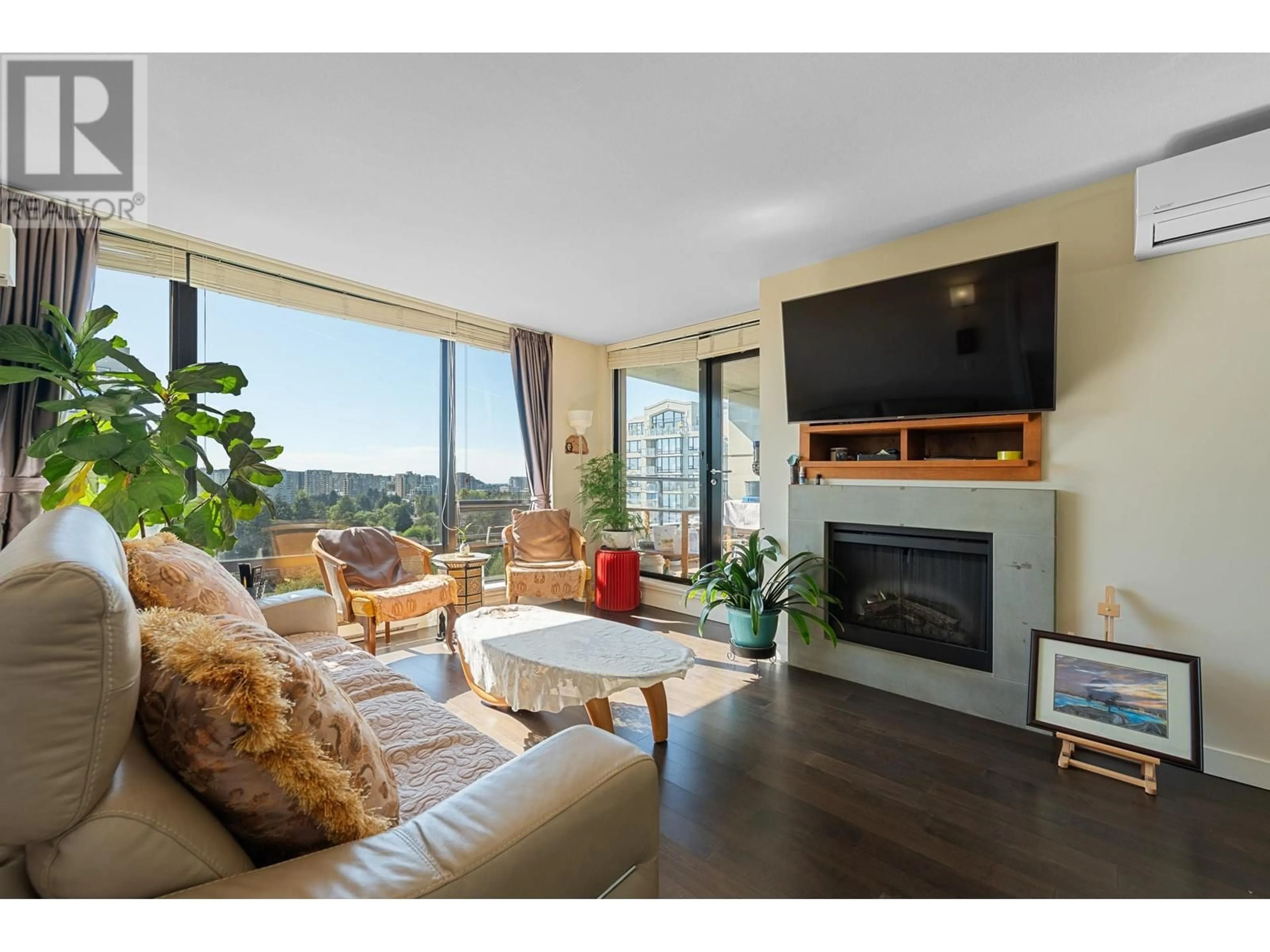 Living room with furniture, wood/laminate floor for 1501 - 9133 HEMLOCK DRIVE, Richmond British Columbia V6Y4J9