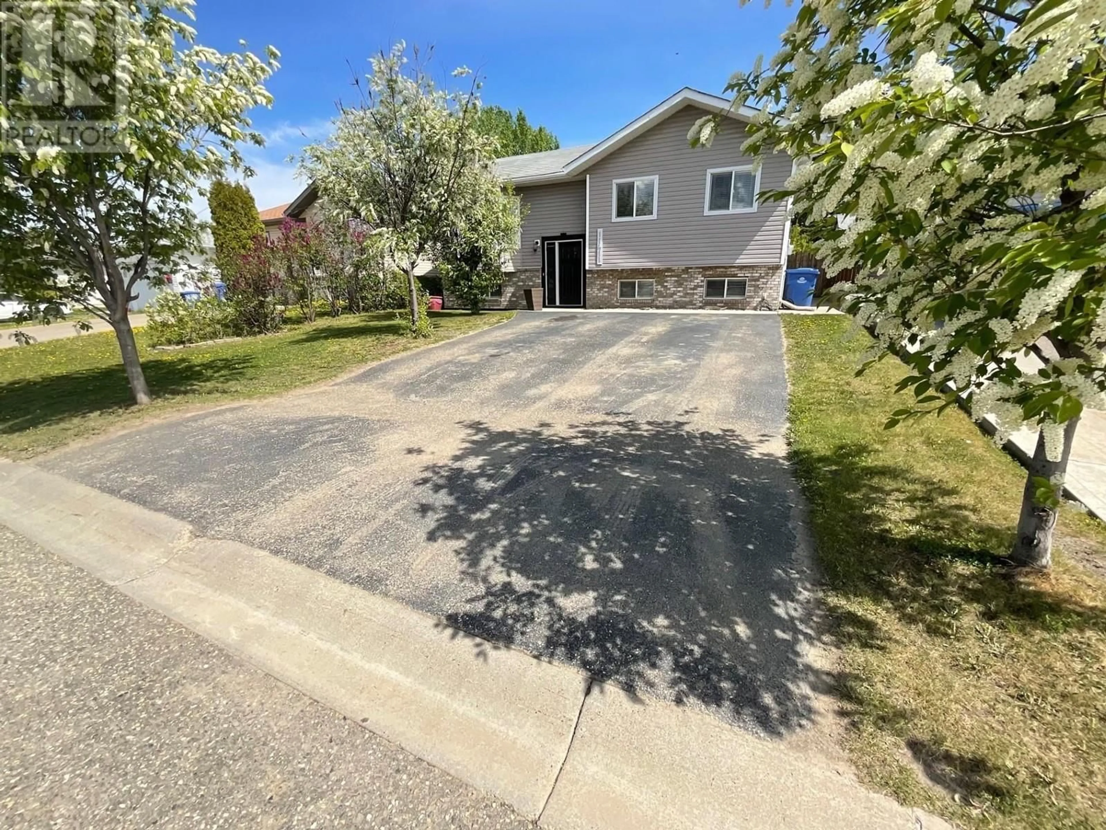 A pic from outside/outdoor area/front of a property/back of a property/a pic from drone, street for 11411 96A STREET, Fort St. John British Columbia V1J7E5