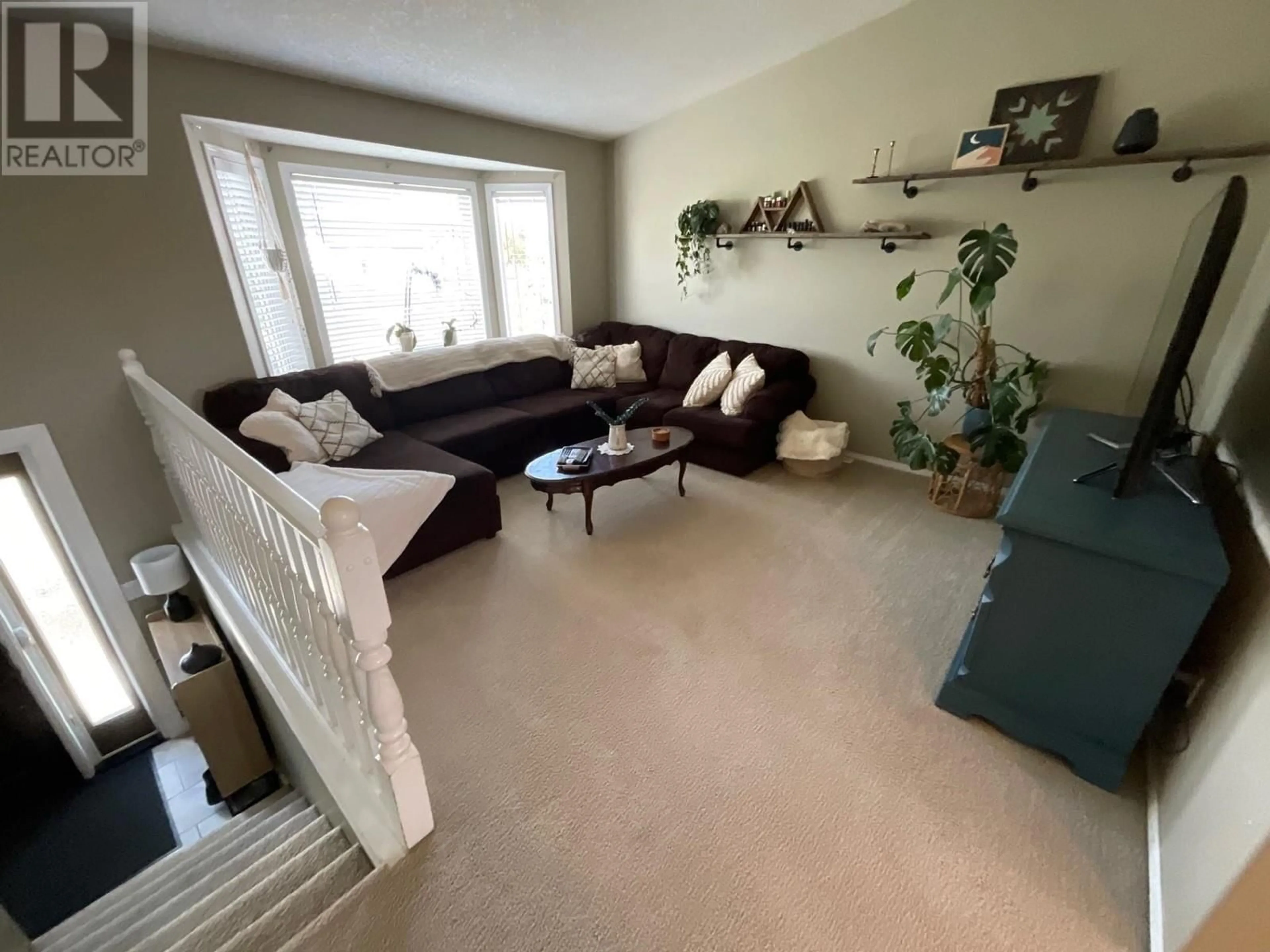 Living room with furniture, floor is not visible for 11411 96A STREET, Fort St. John British Columbia V1J7E5