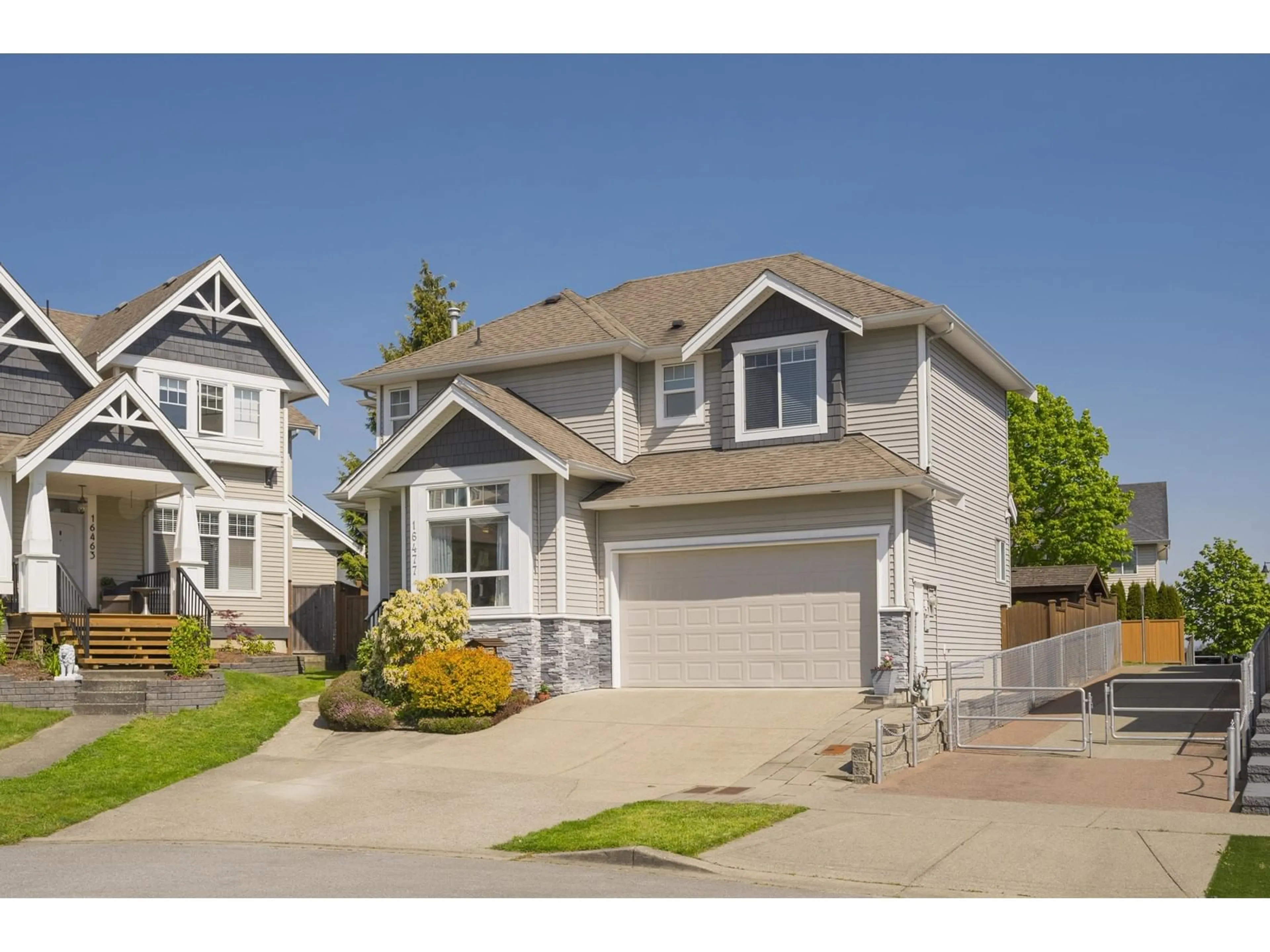 Home with vinyl exterior material, street for 16477 59A, Surrey British Columbia V3S6M6