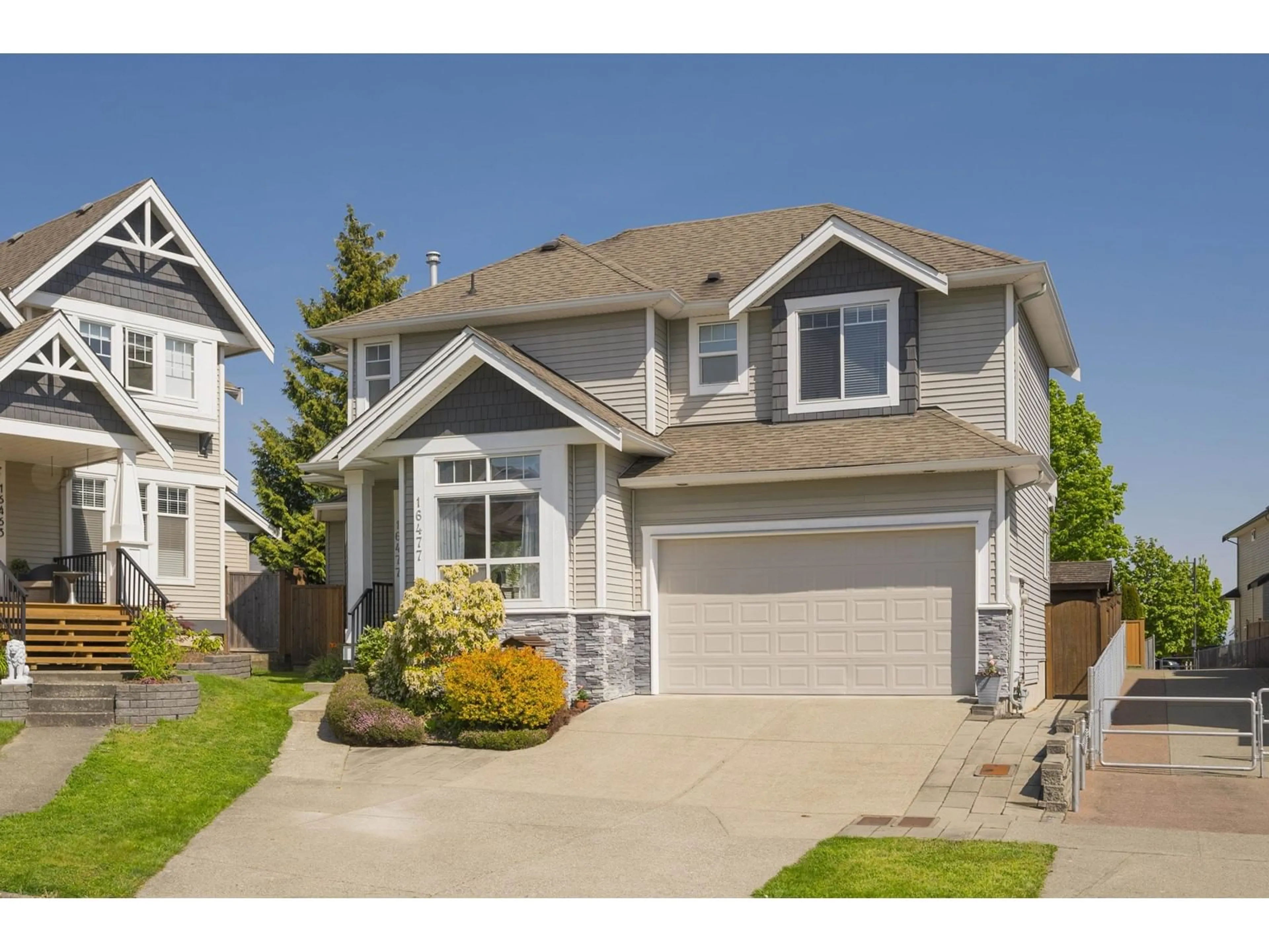 Home with vinyl exterior material, street for 16477 59A, Surrey British Columbia V3S6M6