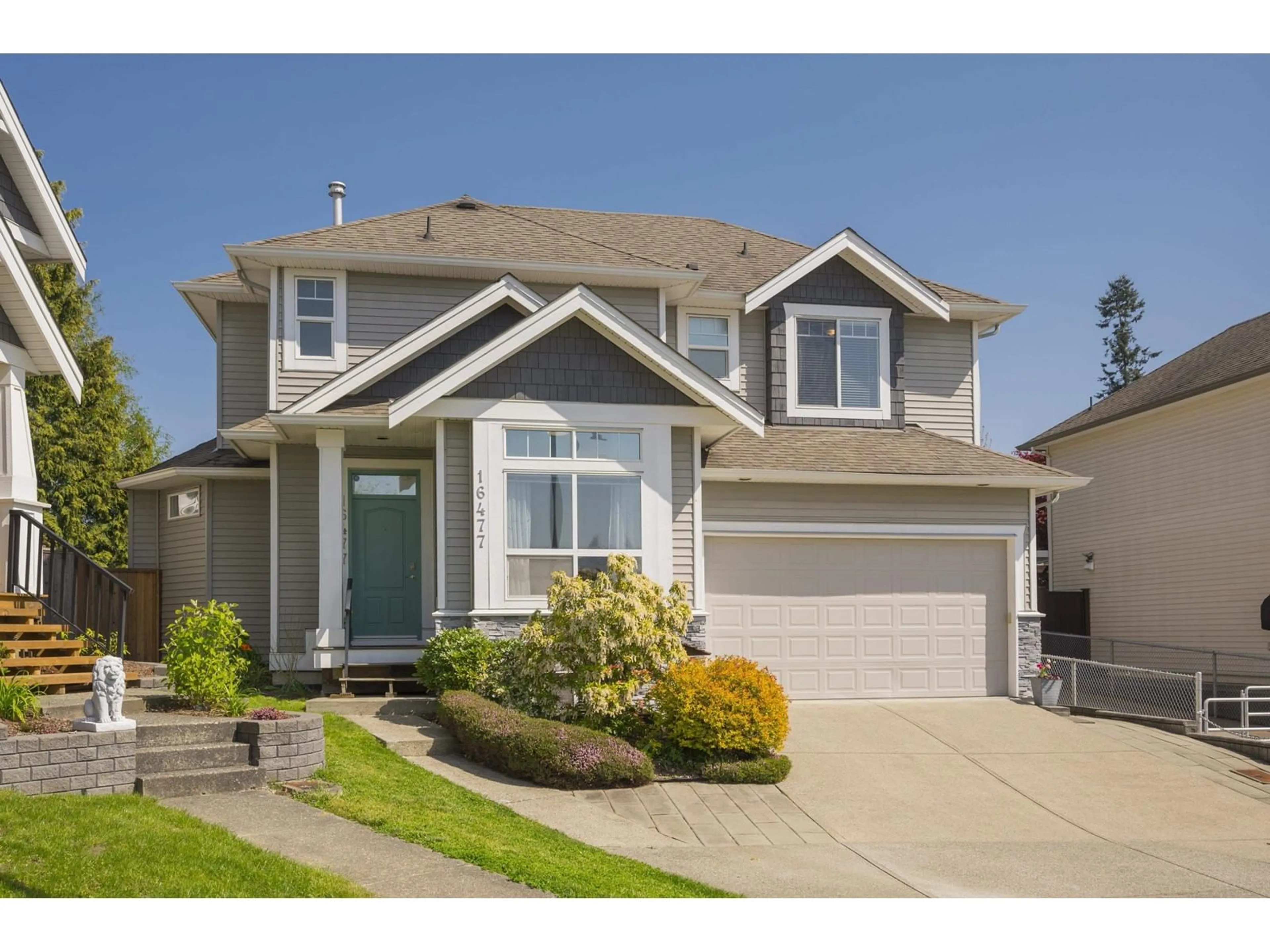 Home with vinyl exterior material, street for 16477 59A, Surrey British Columbia V3S6M6