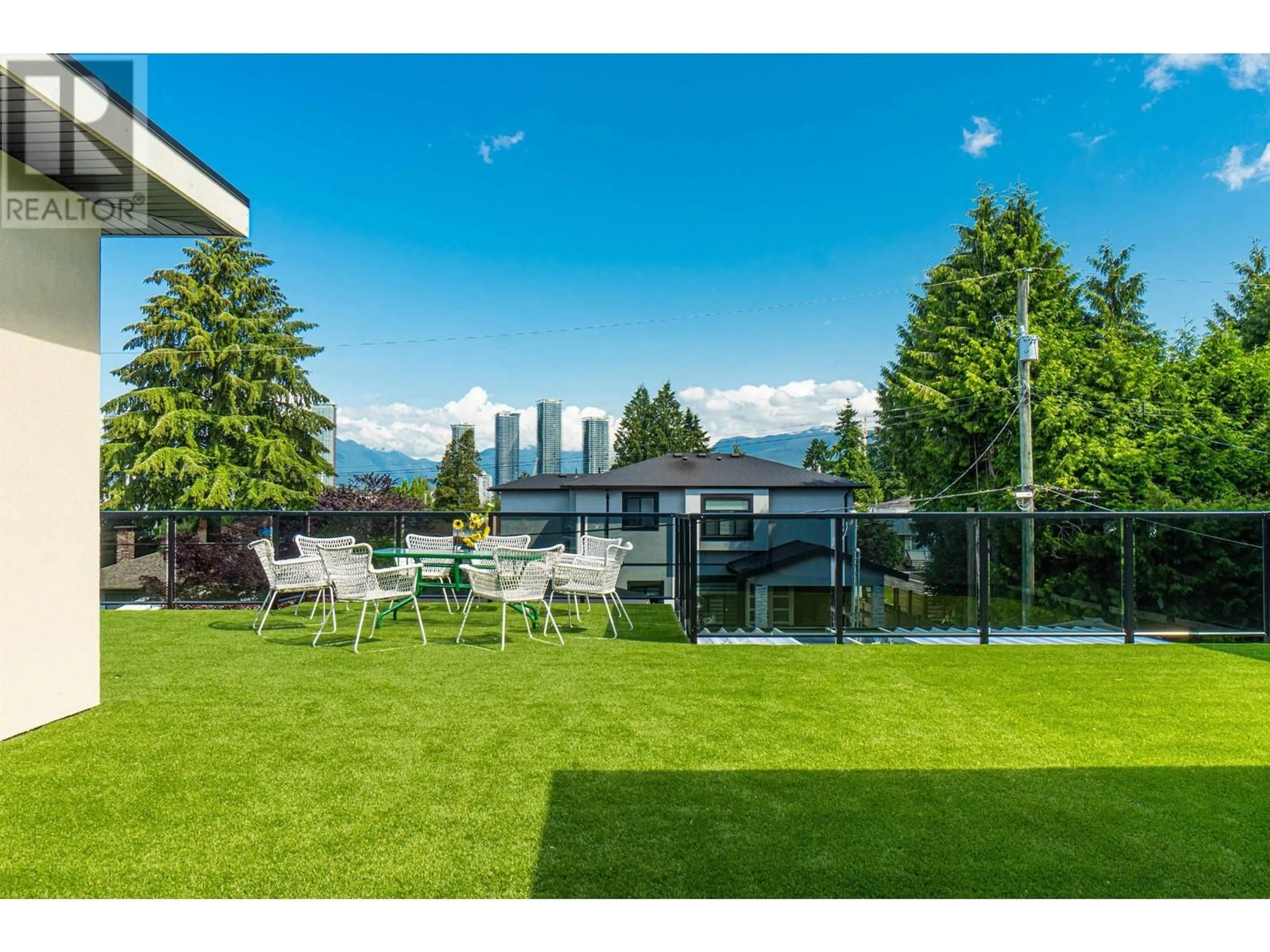 A pic from outside/outdoor area/front of a property/back of a property/a pic from drone, mountain view for 4949 FULWELL STREET, Burnaby British Columbia V5G1P1