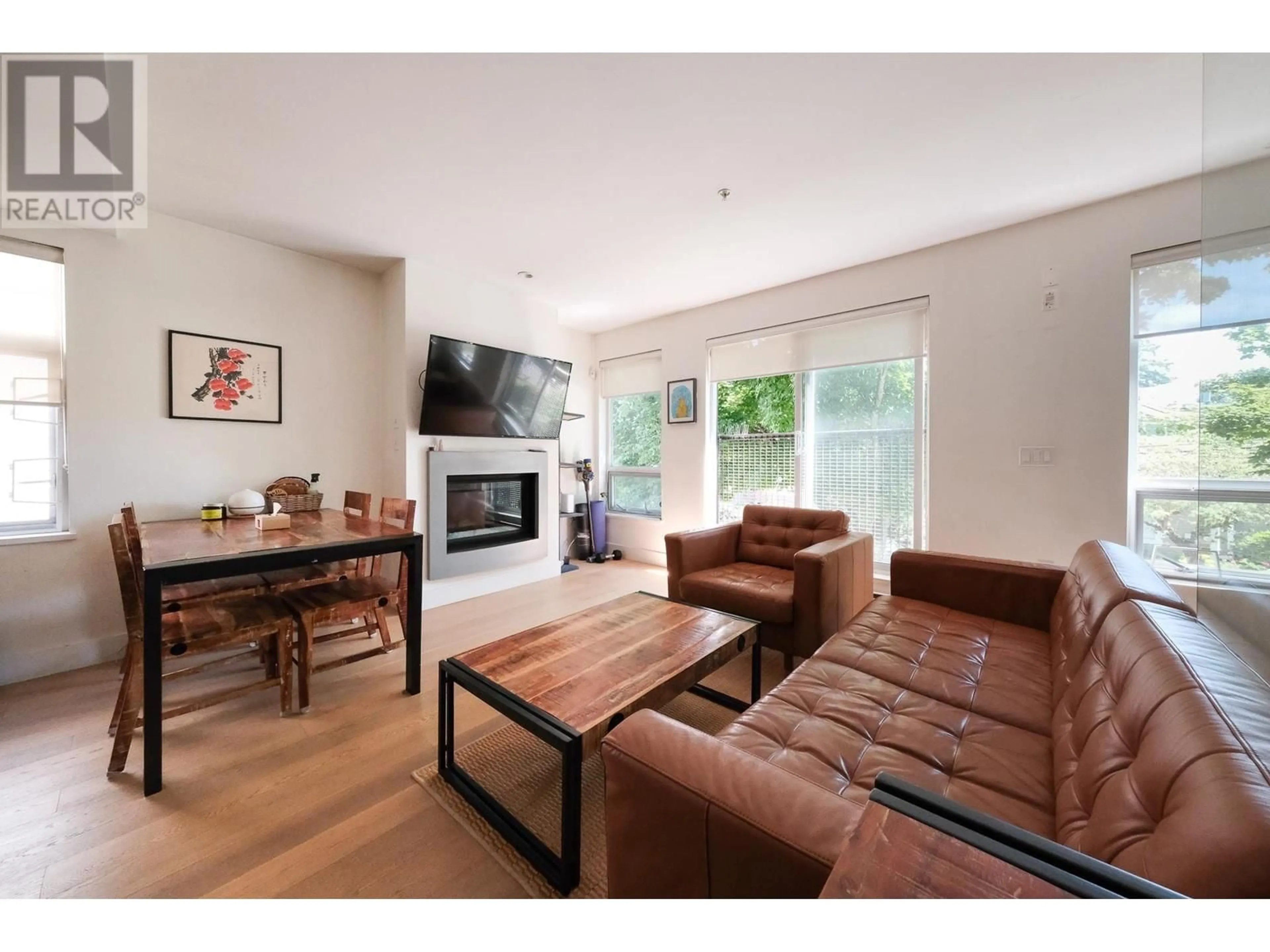Living room with furniture, wood/laminate floor for 3197 ST. GEORGE STREET, Vancouver British Columbia V5T3R9