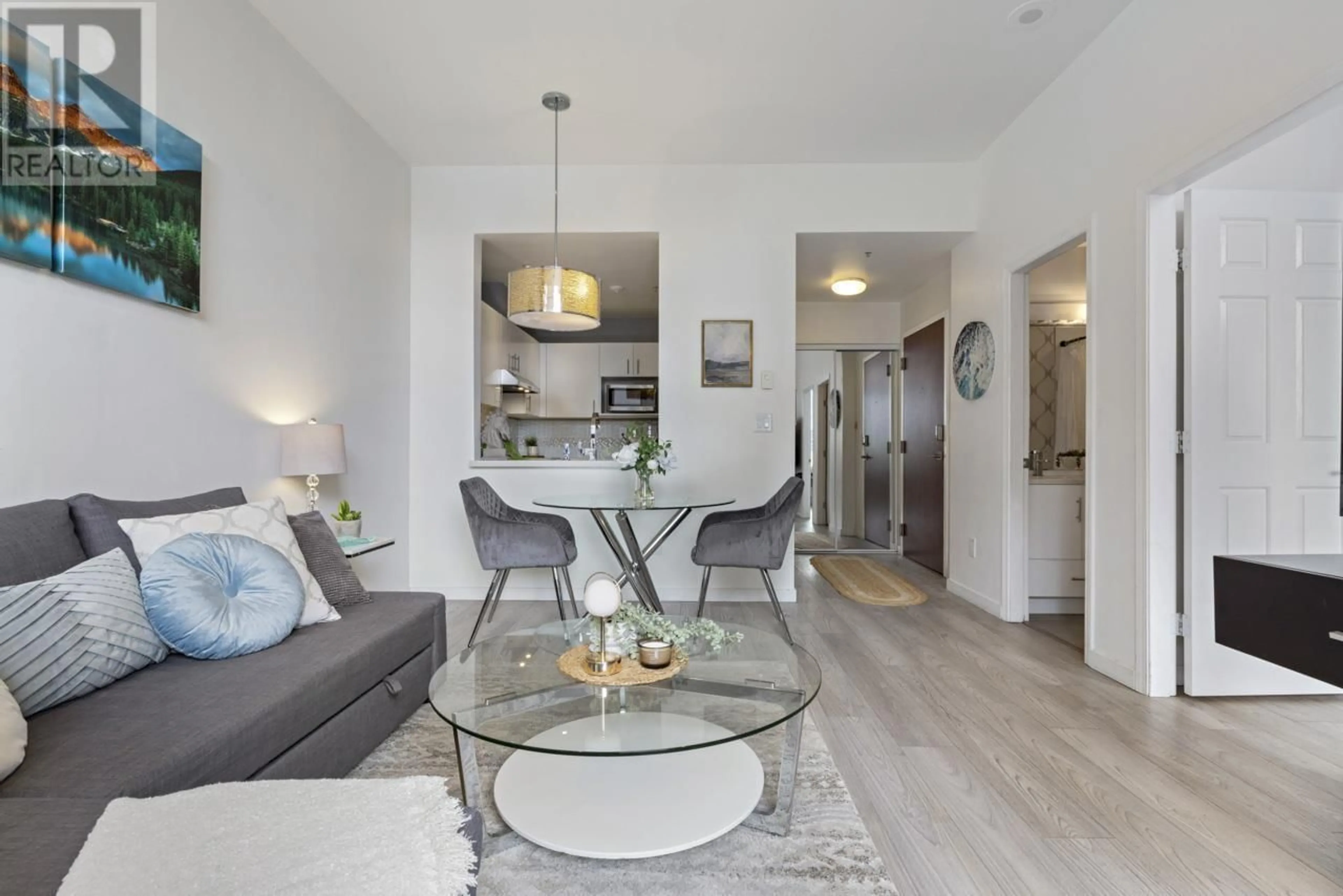 Living room with furniture, wood/laminate floor for 309 - 1010 HOWE STREET, Vancouver British Columbia V6Z1P5