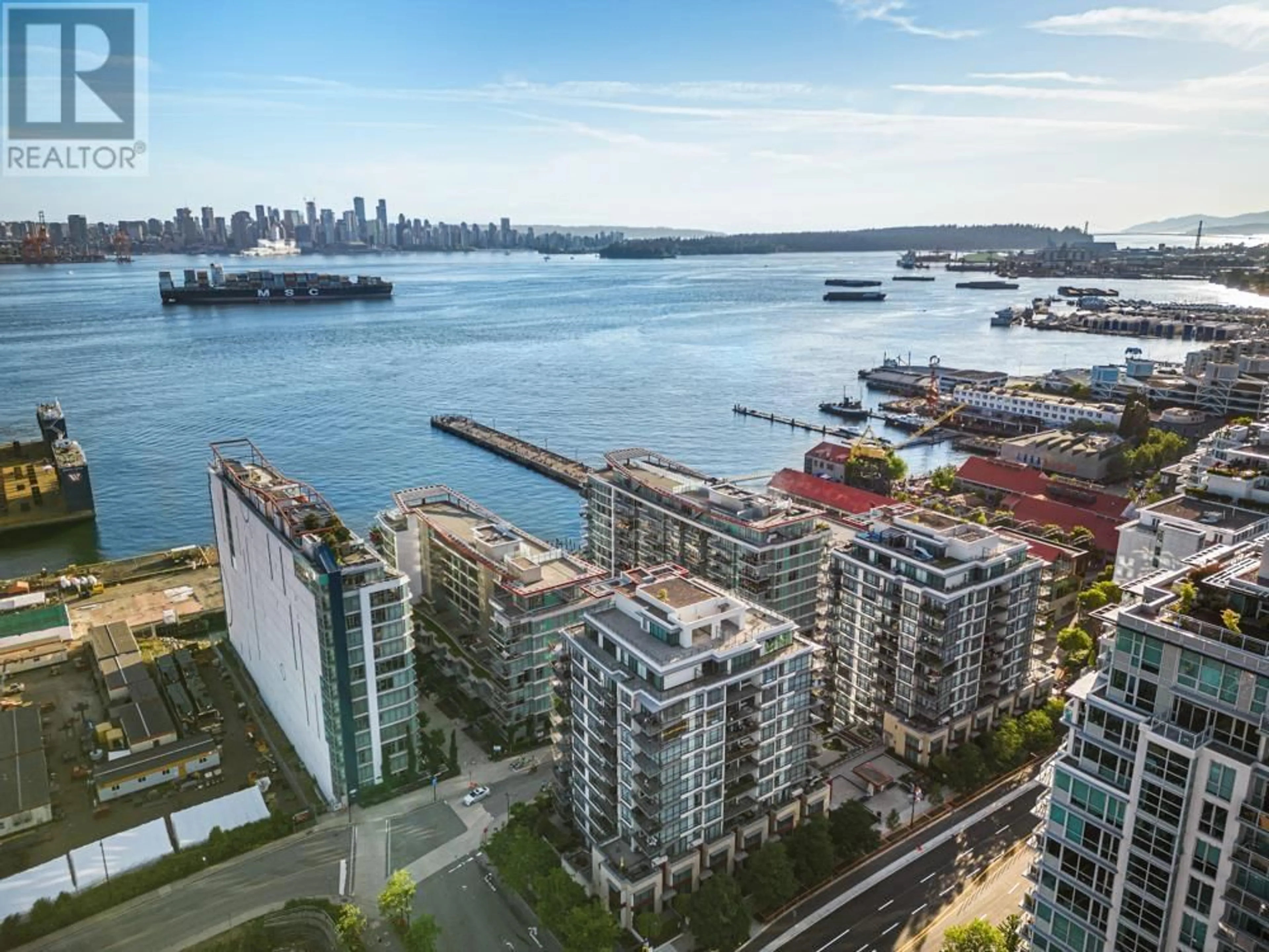 A pic from outside/outdoor area/front of a property/back of a property/a pic from drone, water/lake/river/ocean view for 305 - 185 VICTORY SHIP WAY, North Vancouver British Columbia V7L0G2