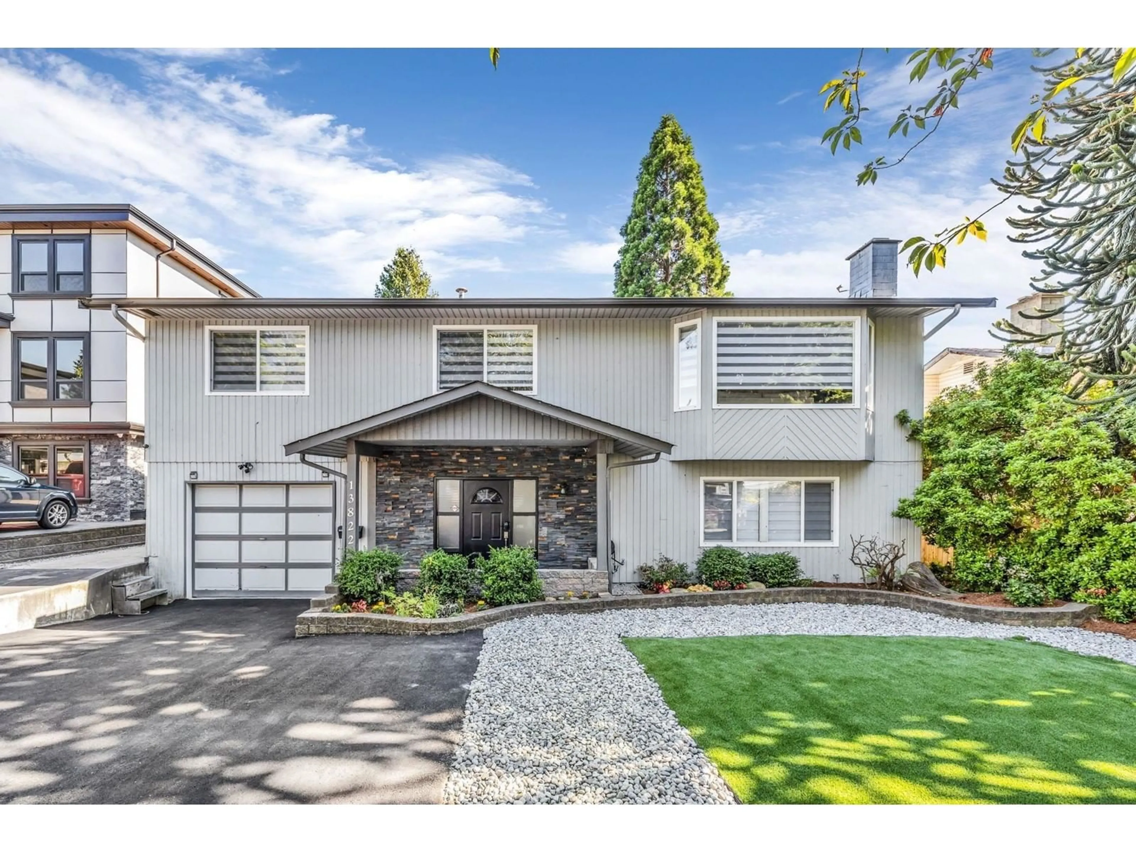 Home with vinyl exterior material, street for 13822 92A, Surrey British Columbia V3V6Y6