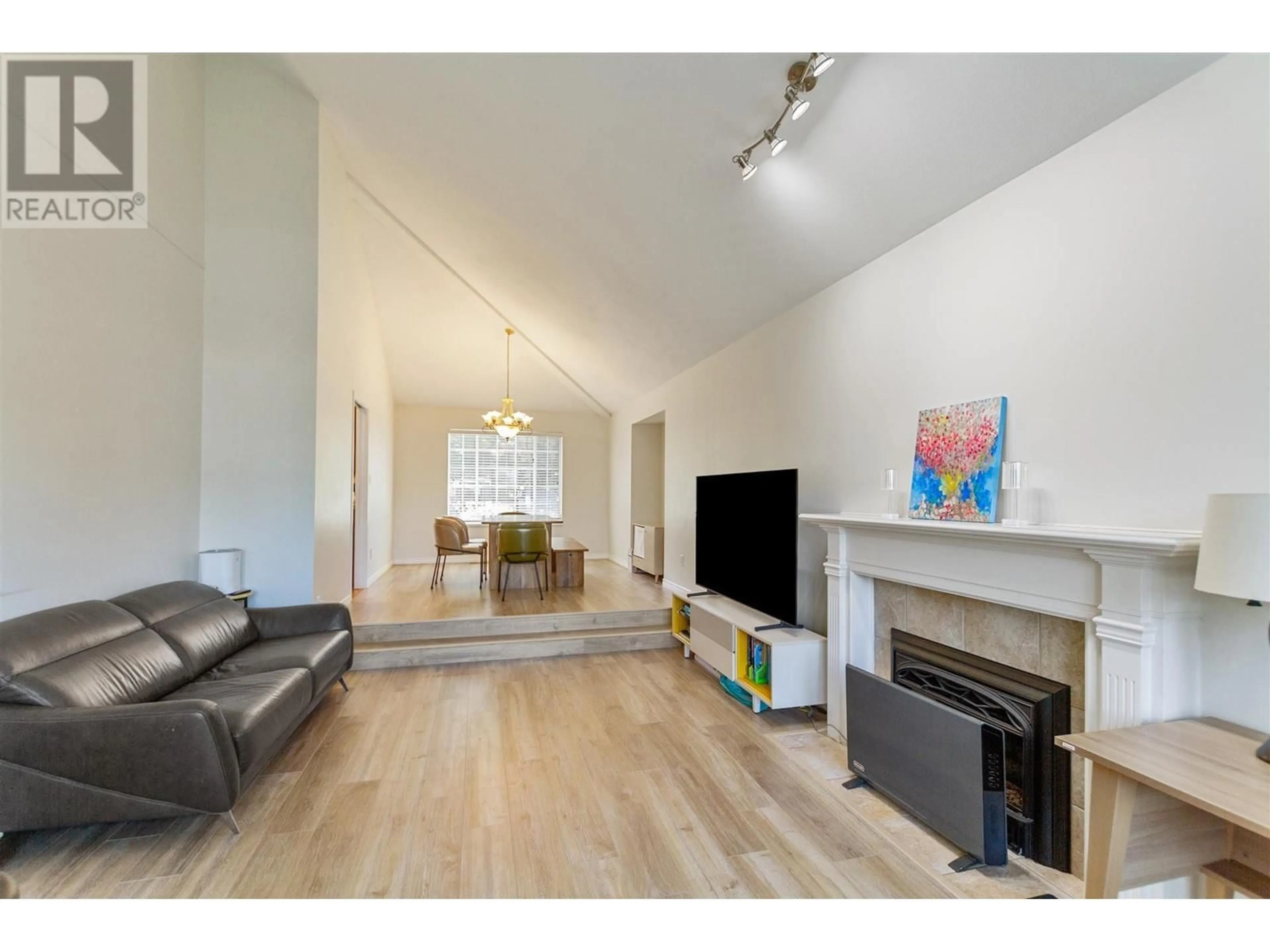 Living room with furniture, wood/laminate floor for 800 SPRICE AVENUE, Coquitlam British Columbia V3J2P1