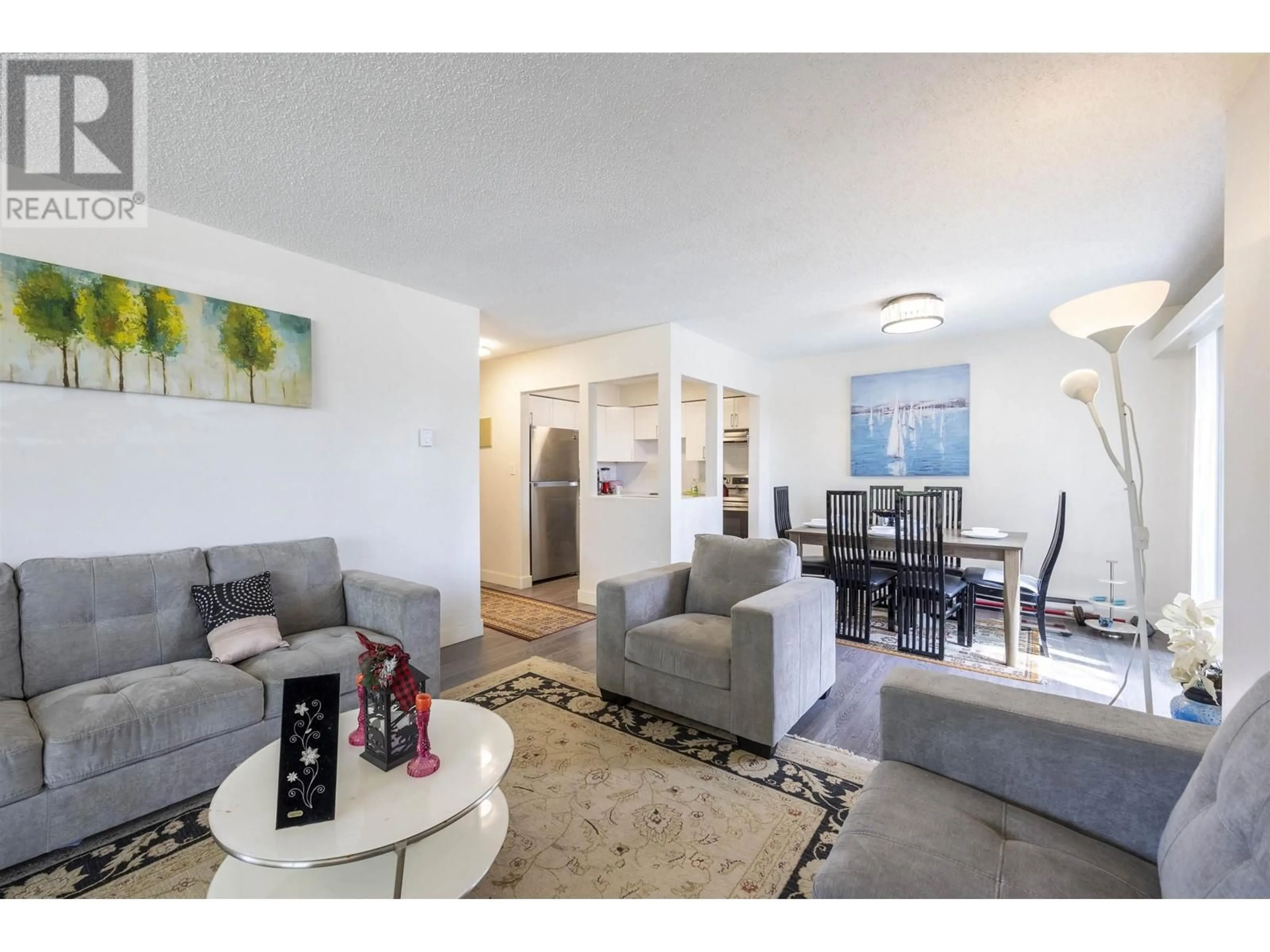 Living room with furniture, unknown for 206 - 6105 KINGSWAY, Burnaby British Columbia V5J5C7