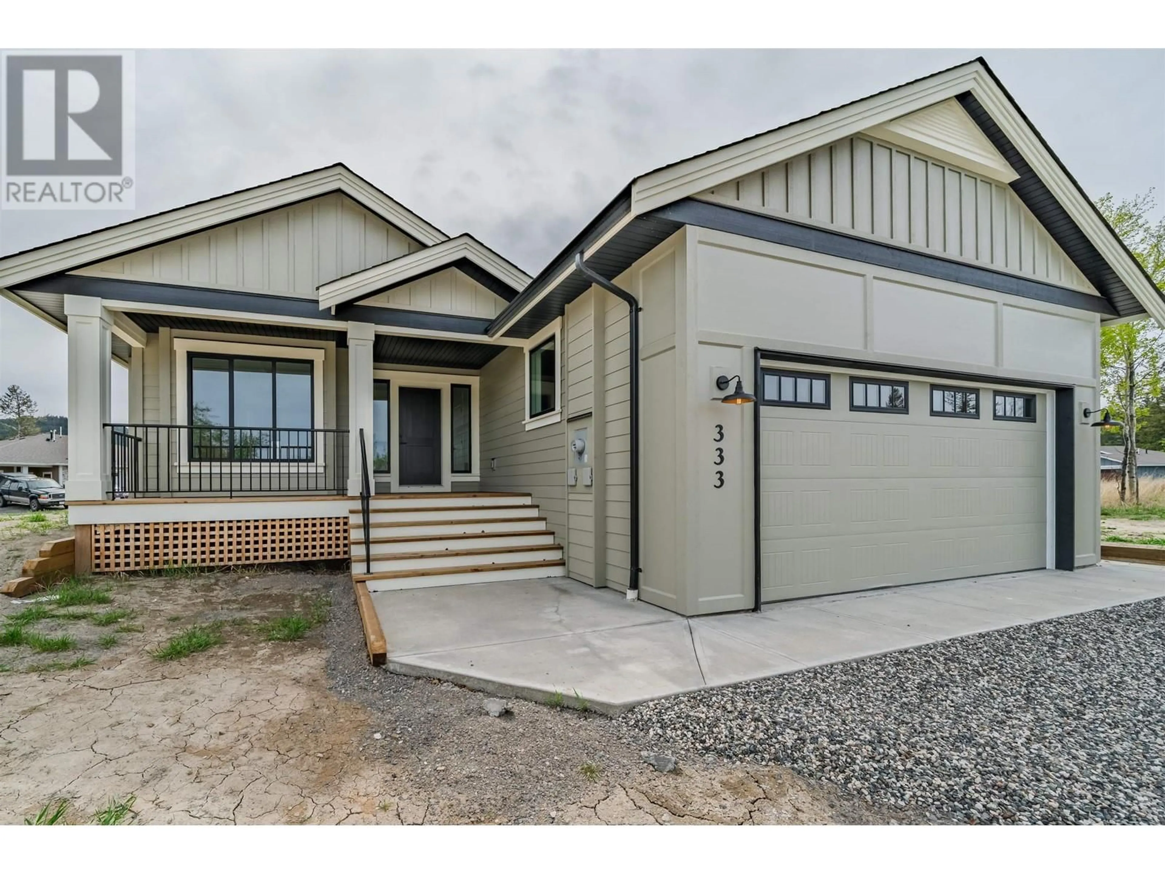 Home with vinyl exterior material, street for 333 SANDHILL CRESCENT, 100 Mile House British Columbia V0K2E0