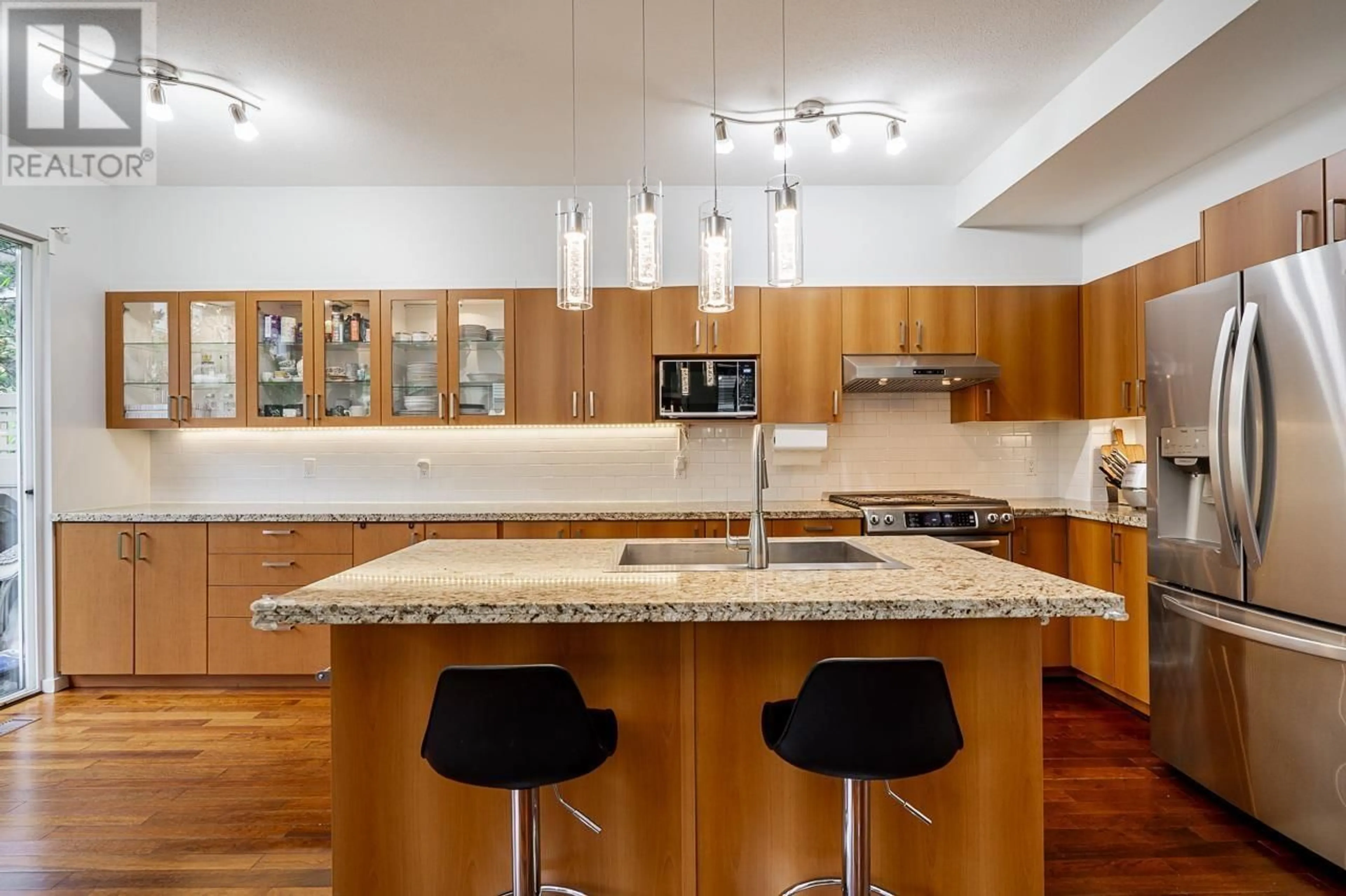 Contemporary kitchen, wood/laminate floor for 113 - 9088 HALSTON COURT, Burnaby British Columbia V3N0A7