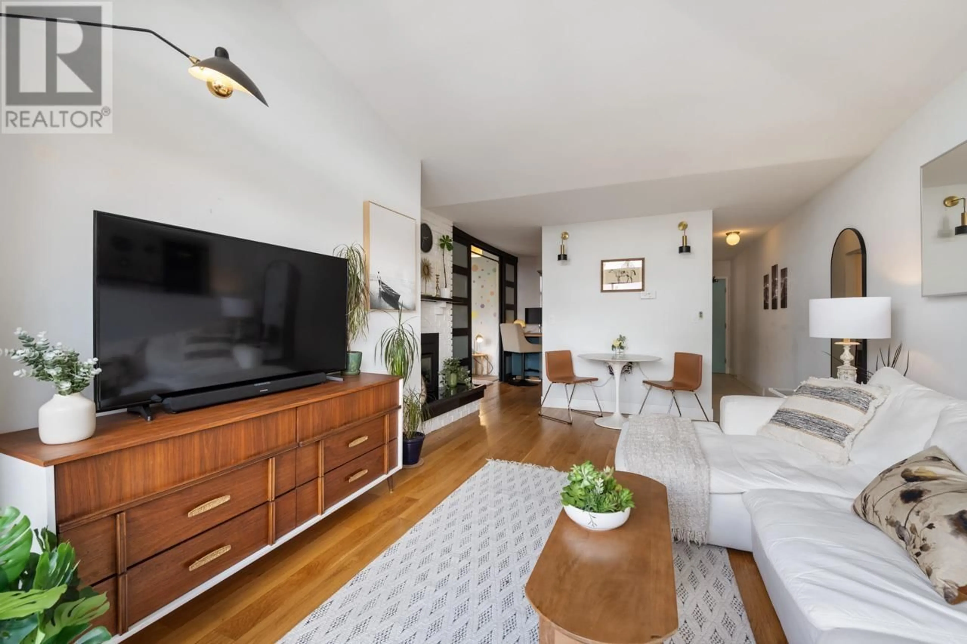 Living room with furniture, wood/laminate floor for 306 - 2910 ONTARIO STREET, Vancouver British Columbia V5T2Y6