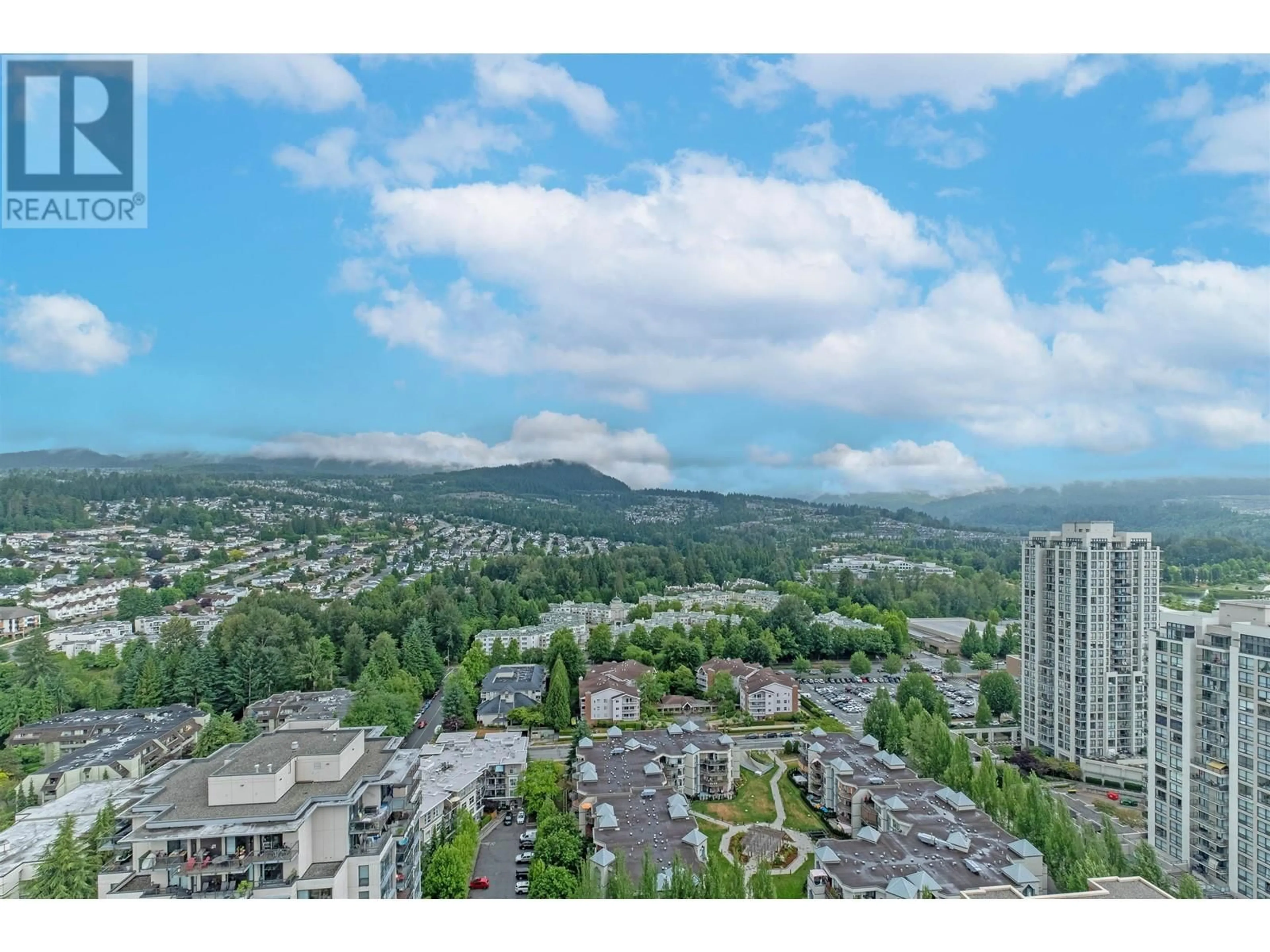 A pic from outside/outdoor area/front of a property/back of a property/a pic from drone, mountain view for 3205 - 2968 GLEN DRIVE, Coquitlam British Columbia V3B0C4
