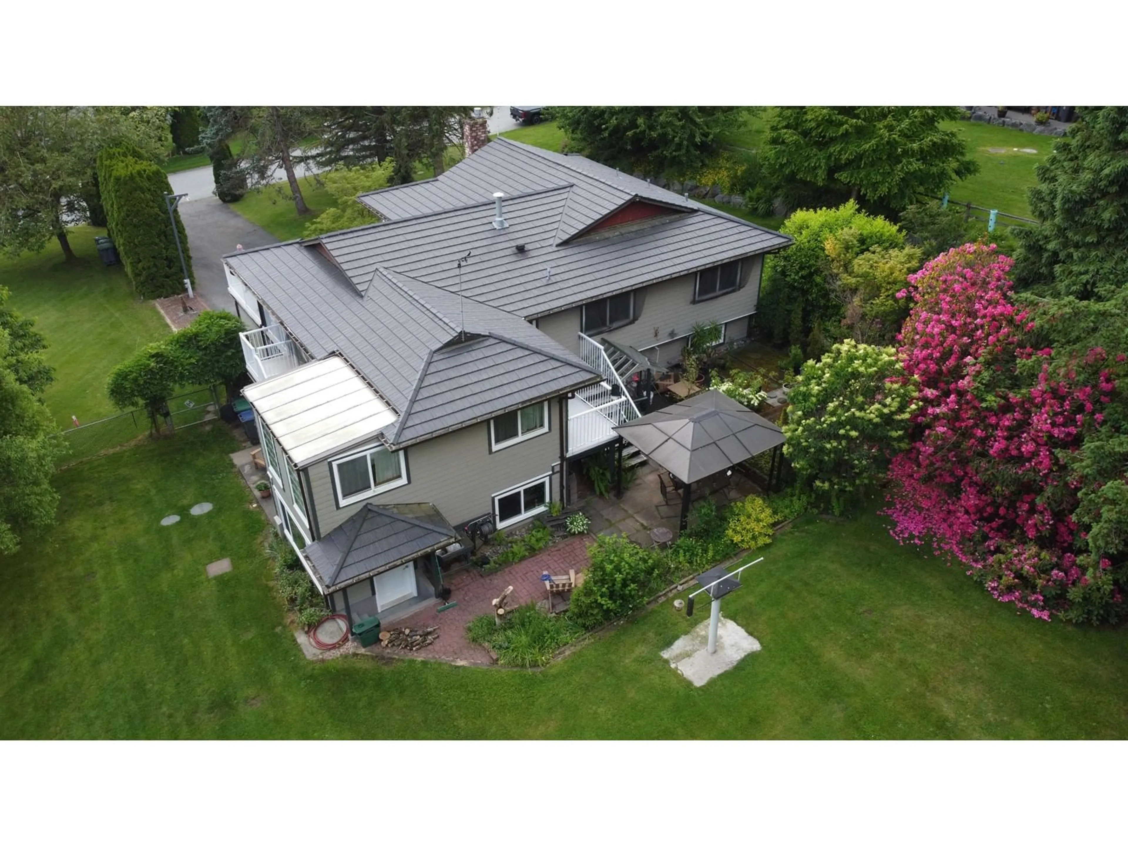 A pic from outside/outdoor area/front of a property/back of a property/a pic from drone, unknown for 18073 19A, Surrey British Columbia V3Z9V2