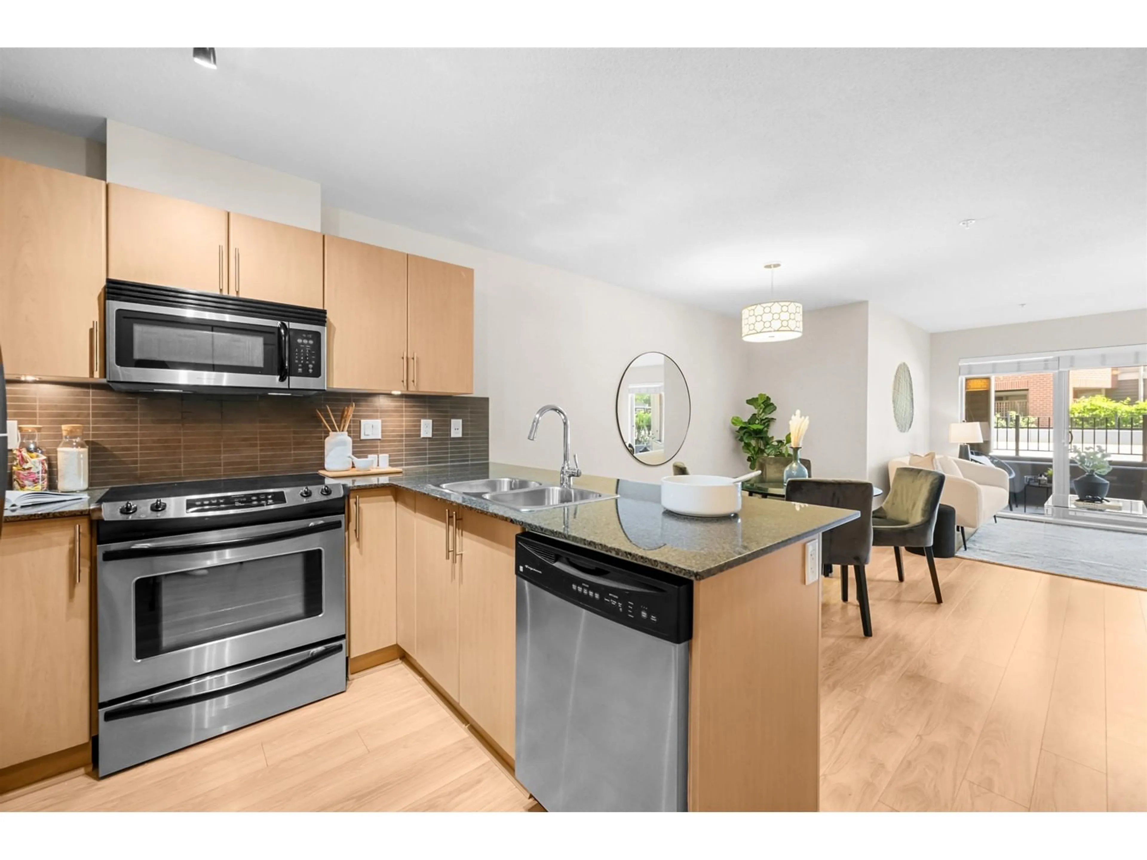 Open concept kitchen, unknown for E102 - 8929 202, Langley British Columbia V1M0B4