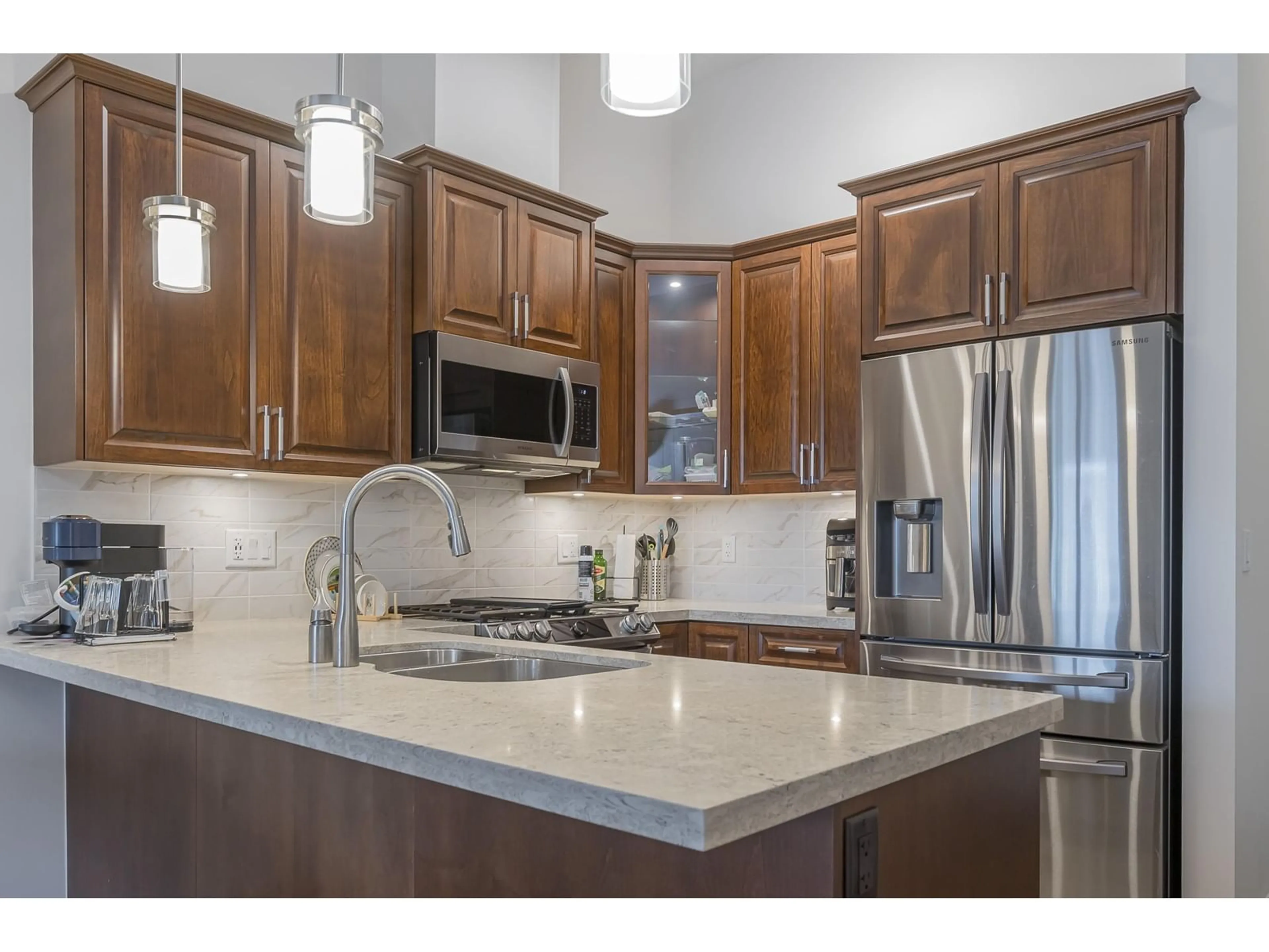 Open concept kitchen, ceramic/tile floor for 612 - 8538 203A, Langley British Columbia V2Y3P9