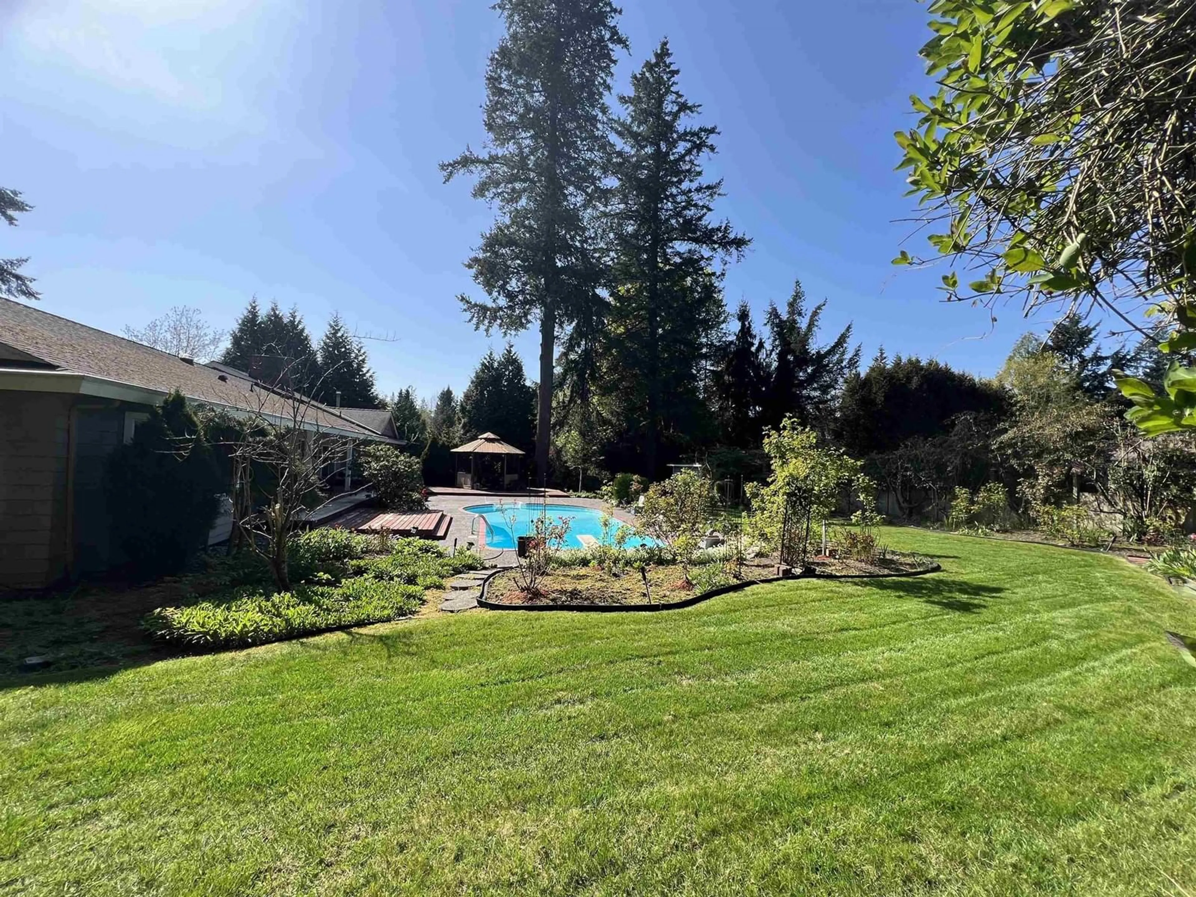 A pic from outside/outdoor area/front of a property/back of a property/a pic from drone, water/lake/river/ocean view for 14387 24A, Surrey British Columbia V4P1R8