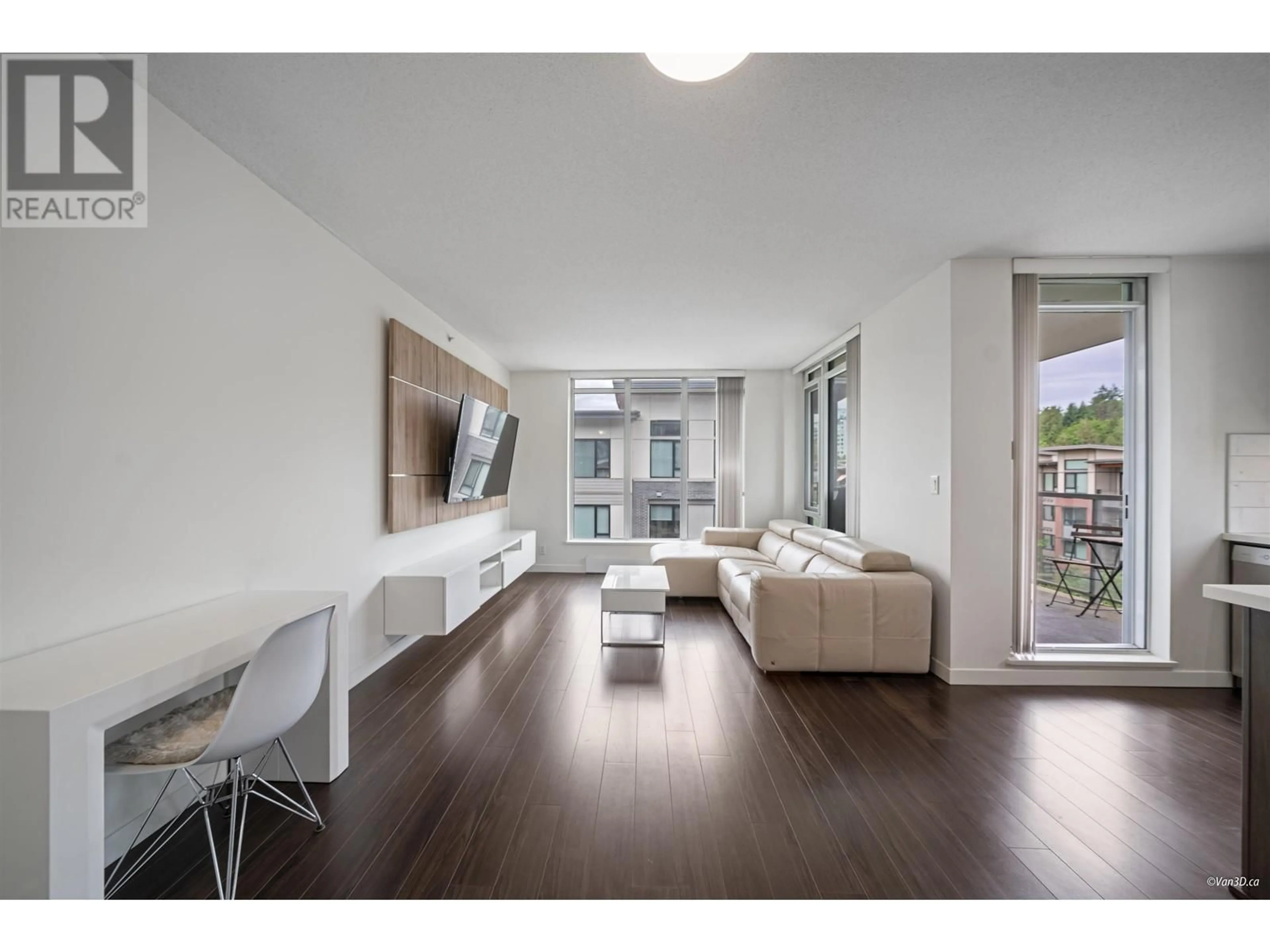 Living room with furniture, wood/laminate floor for 402 - 3162 RIVERWALK AVENUE, Vancouver British Columbia V5S0B7
