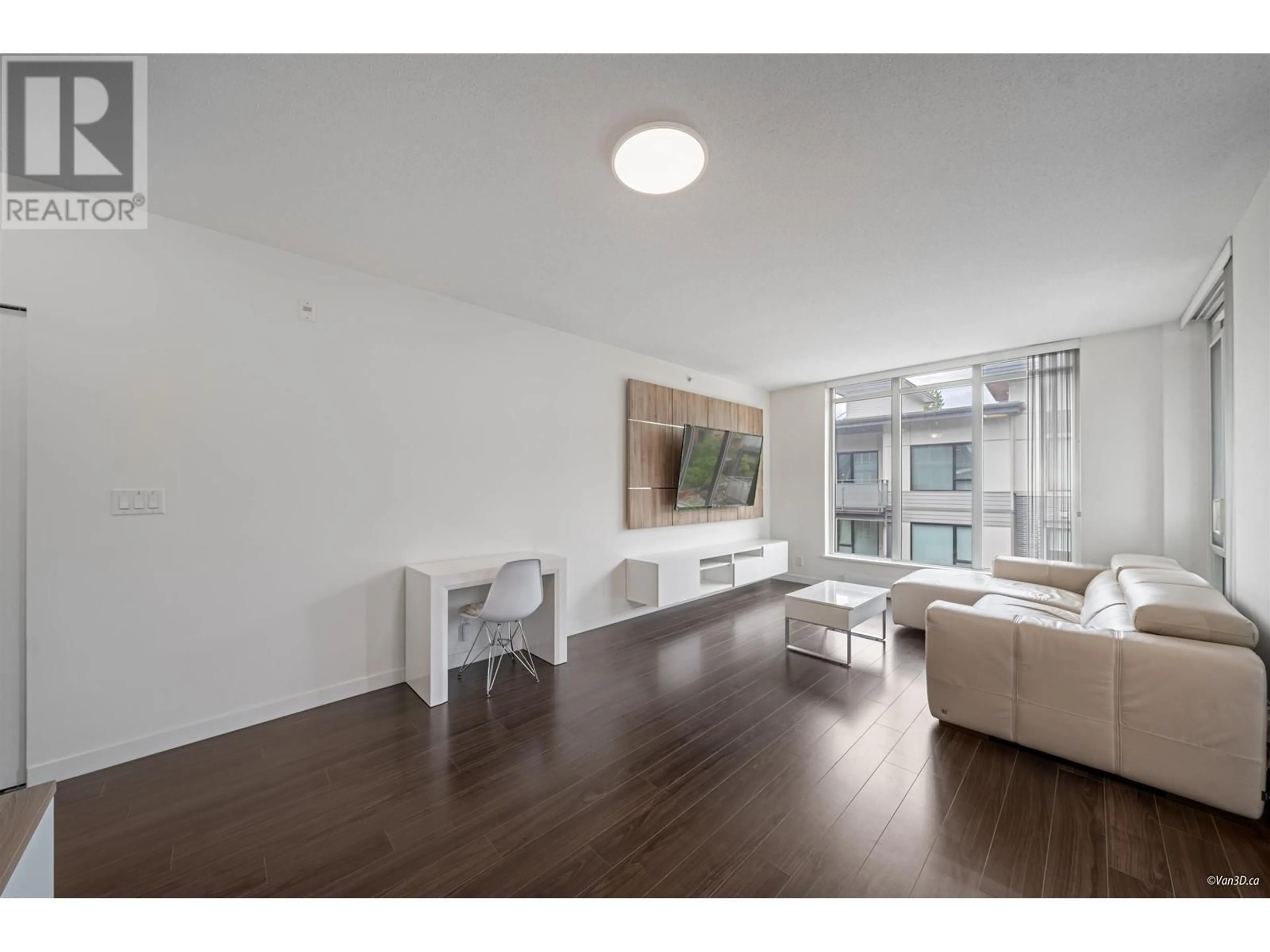 Living room with furniture, wood/laminate floor for 402 - 3162 RIVERWALK AVENUE, Vancouver British Columbia V5S0B7