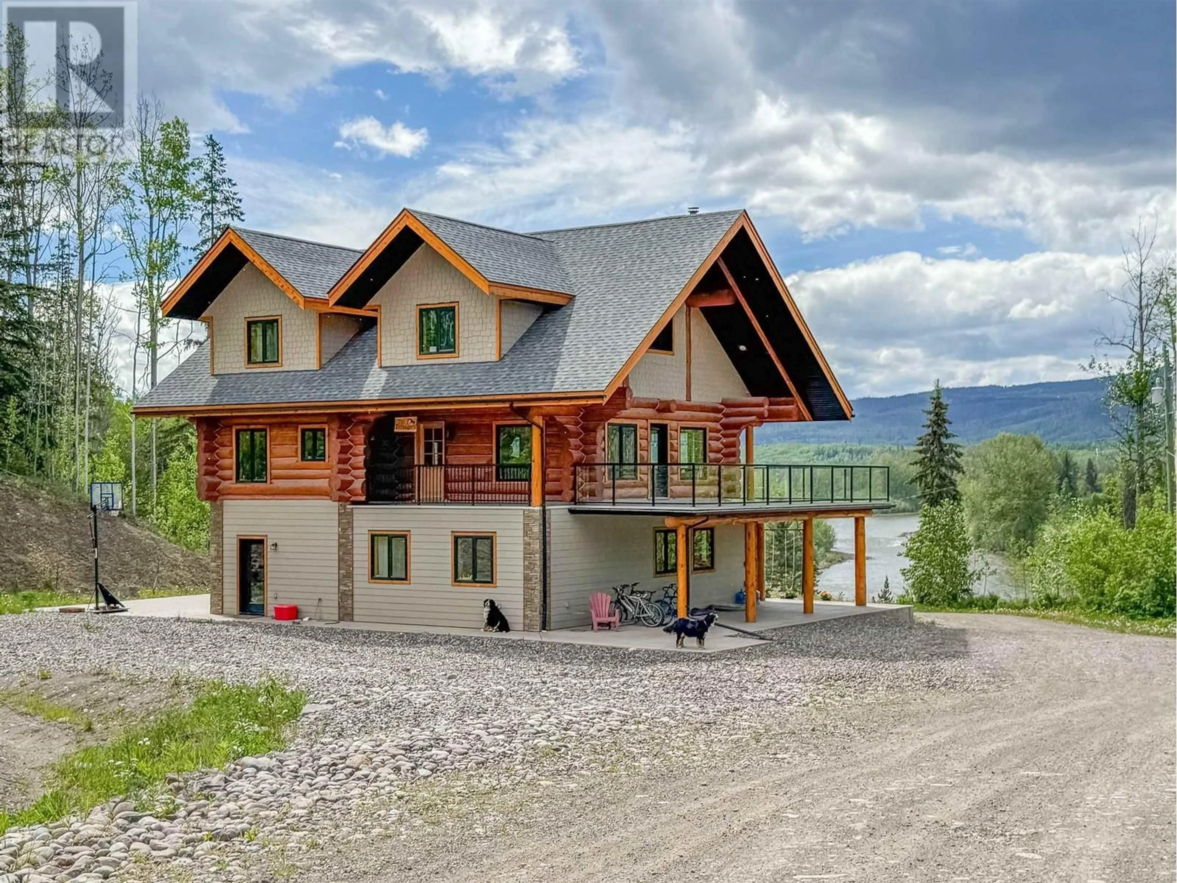 Home with vinyl exterior material, mountain view for 585 16 HIGHWAY, Smithers British Columbia V0J2N6