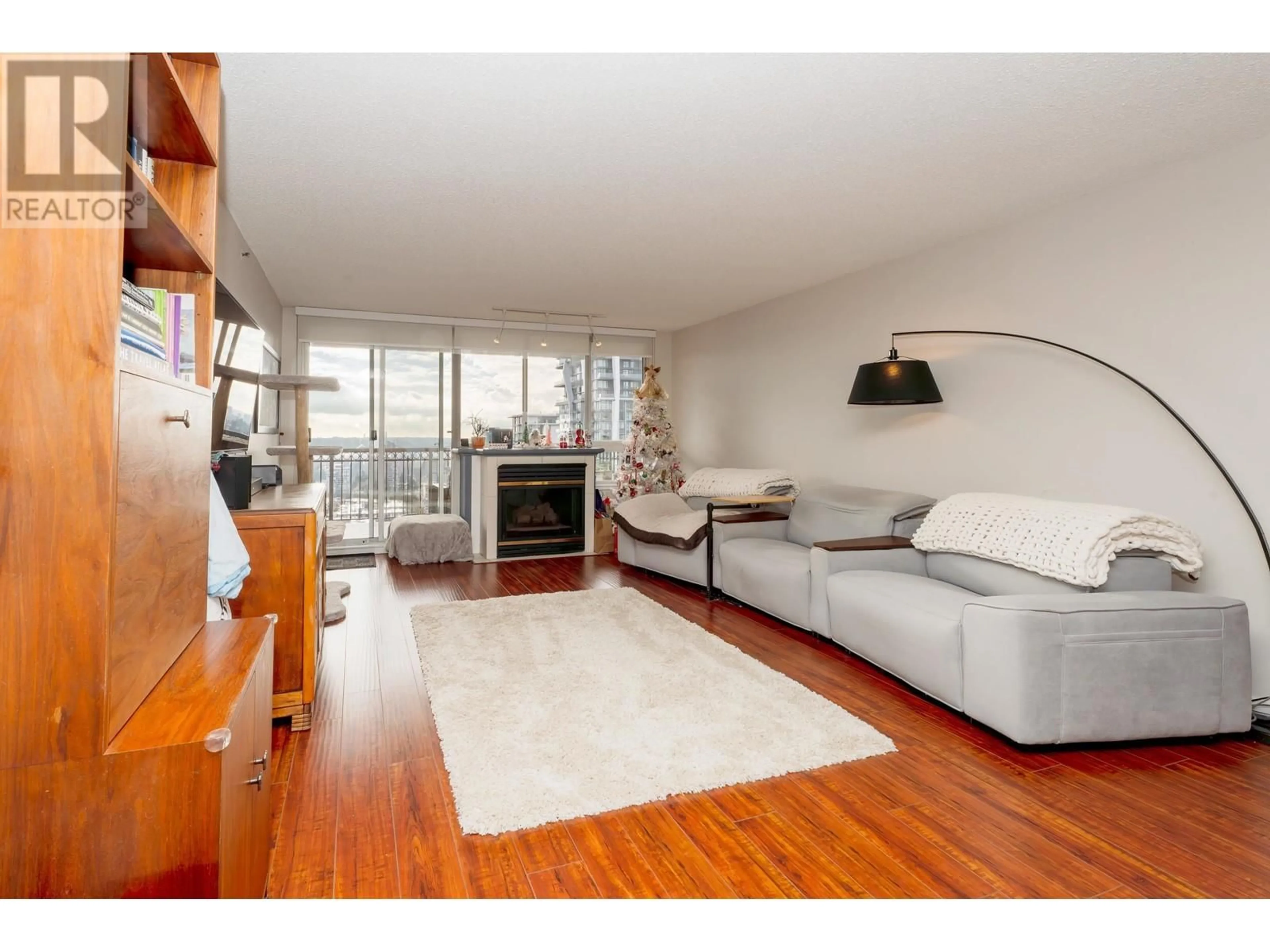 Living room with furniture, wood/laminate floor for 1901 - 551 AUSTIN AVENUE, Coquitlam British Columbia V3K6R7