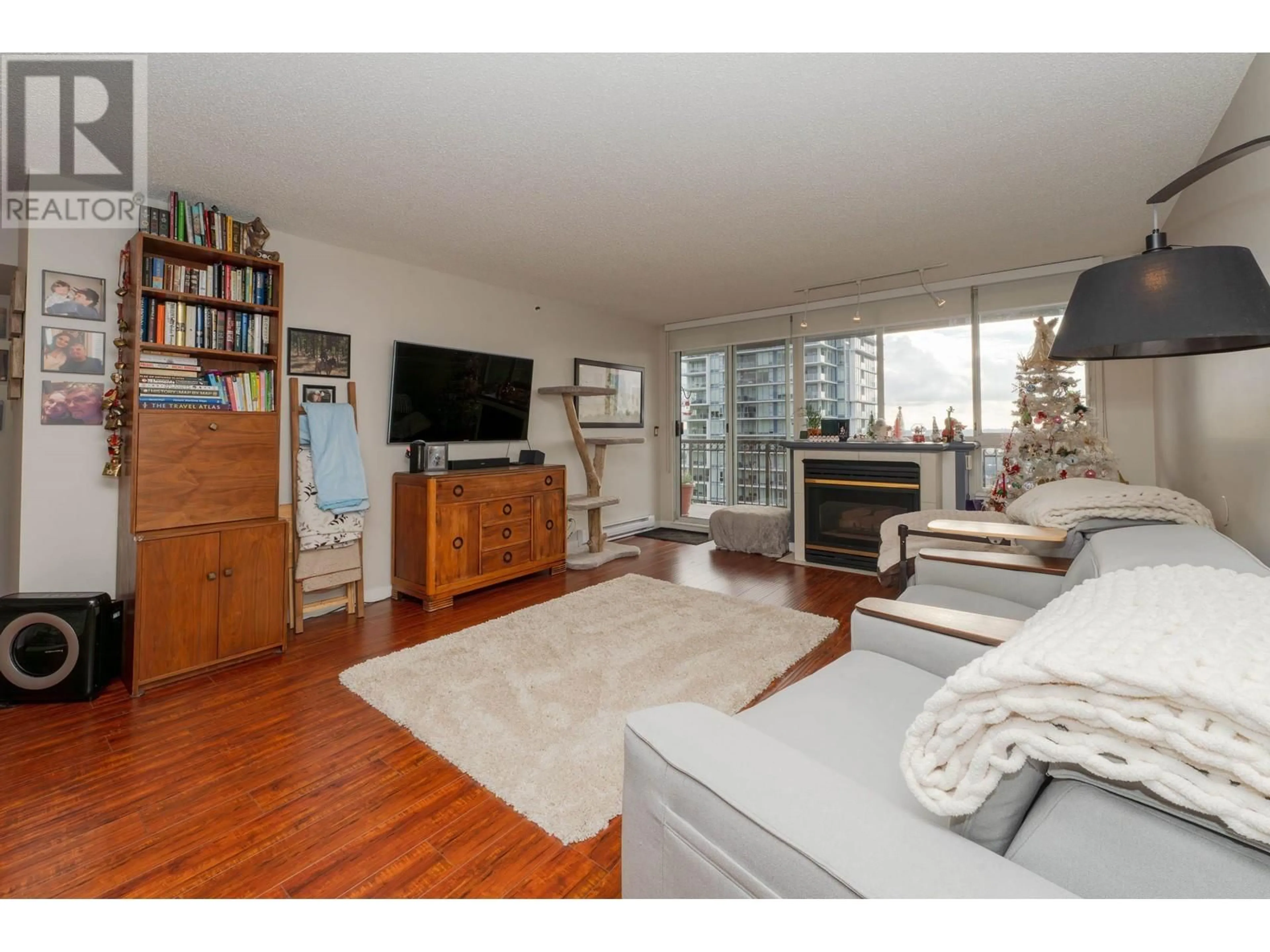 Living room with furniture, wood/laminate floor for 1901 - 551 AUSTIN AVENUE, Coquitlam British Columbia V3K6R7