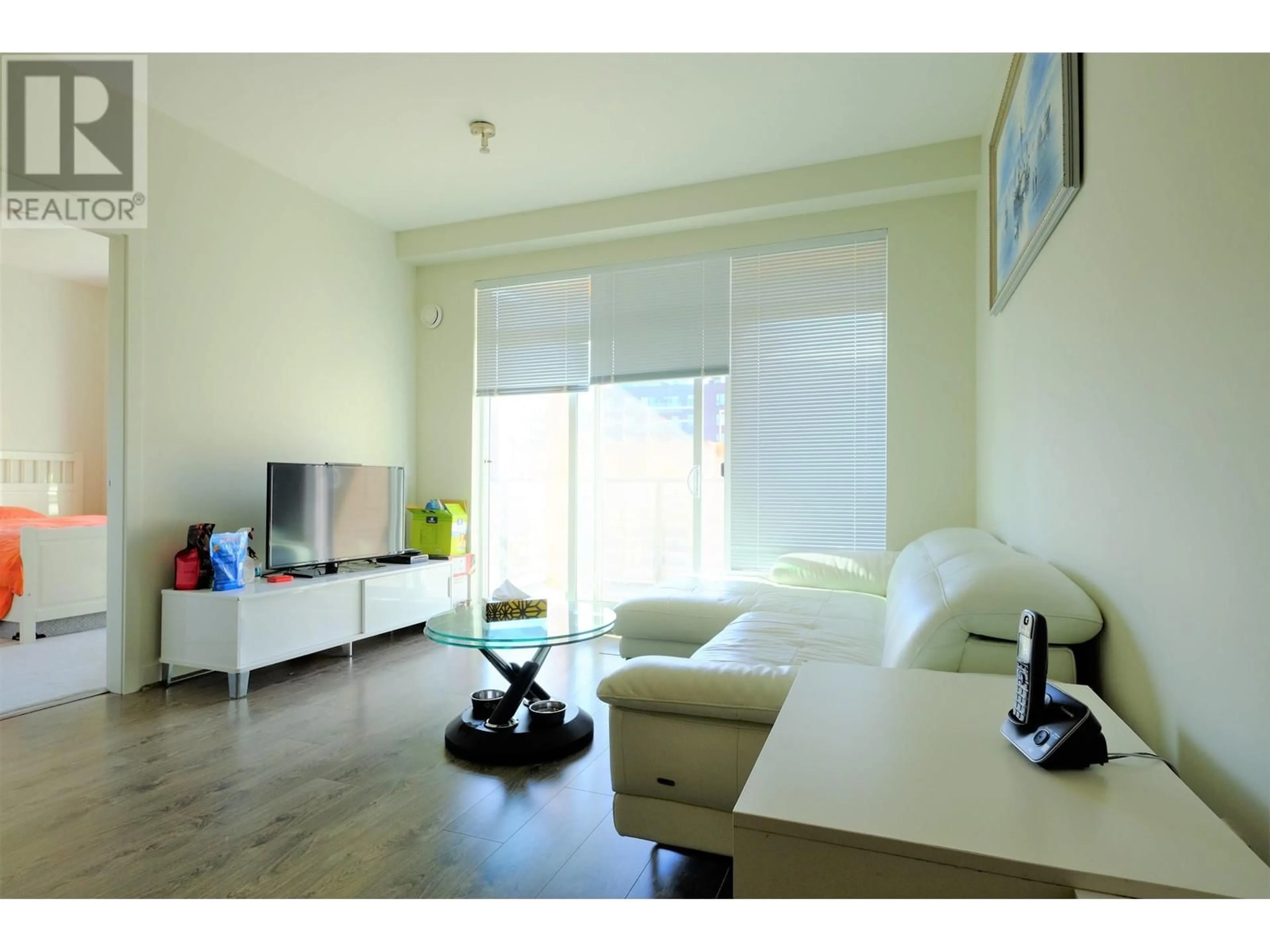 Living room with furniture, wood/laminate floor for 309 - 5981 GRAY AVENUE, Vancouver British Columbia V6S0G1