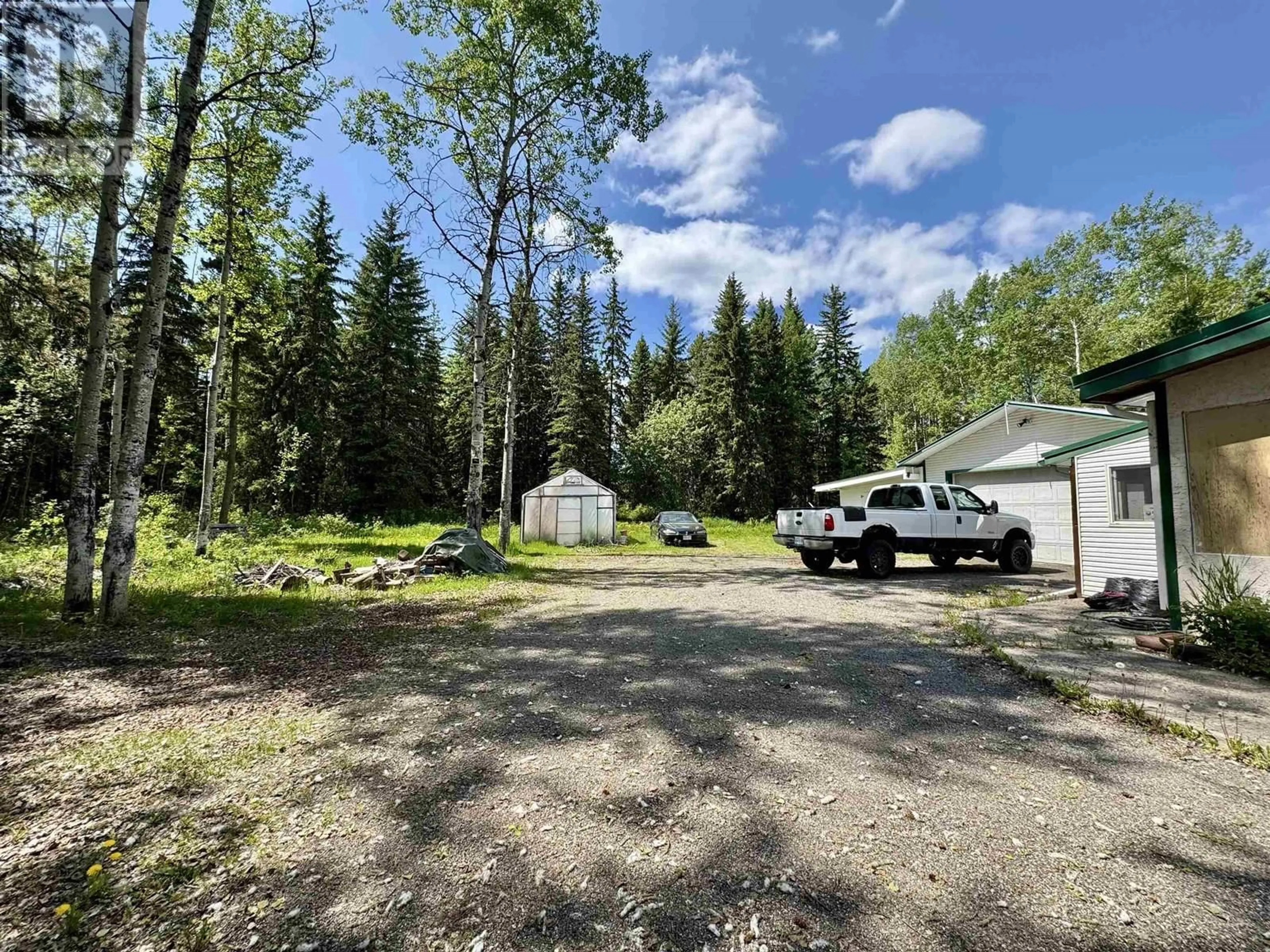 A pic from outside/outdoor area/front of a property/back of a property/a pic from drone, forest/trees view for 1963 W BITTNER ROAD, Prince George British Columbia V2N6T1