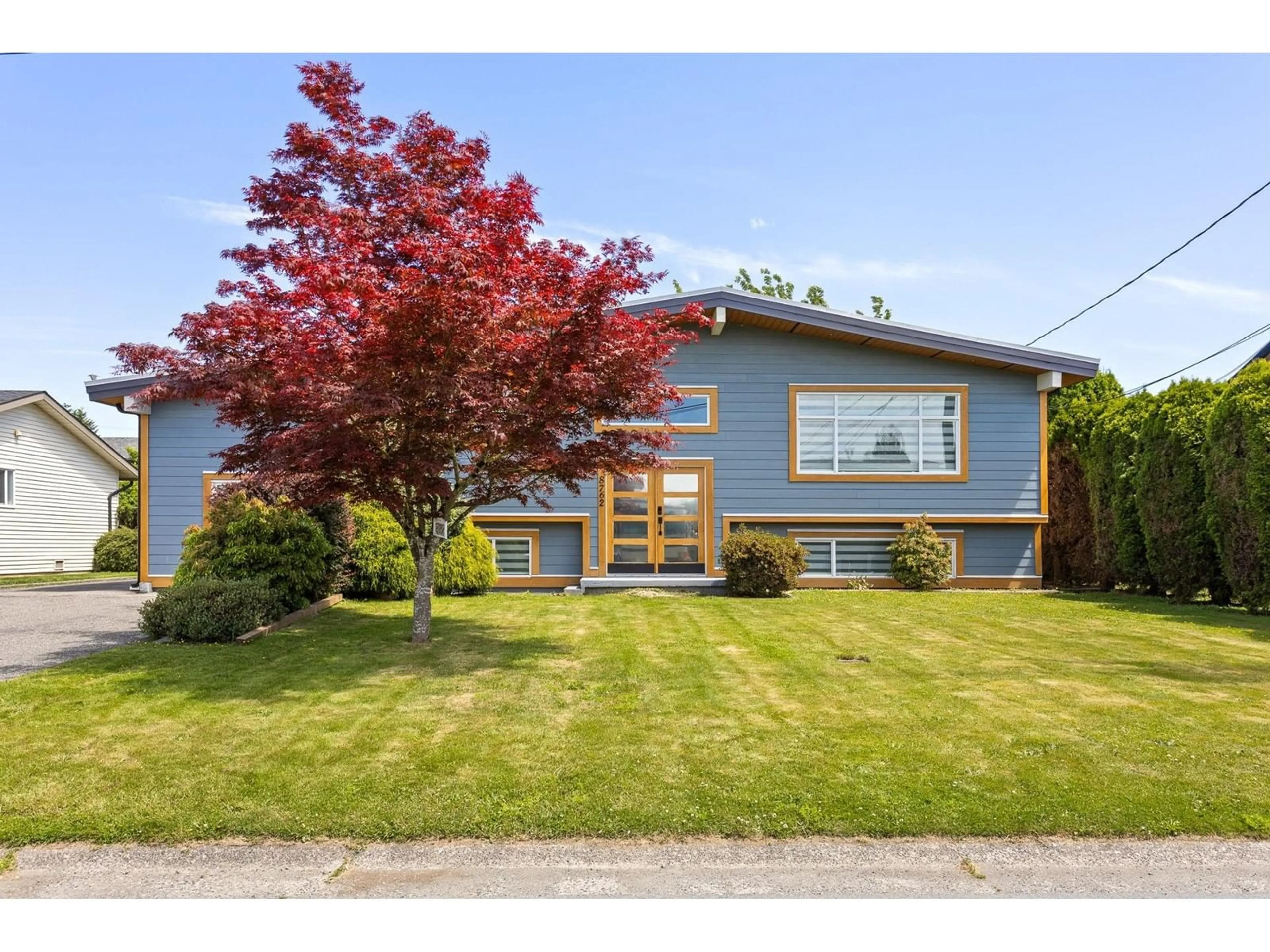 Home with vinyl exterior material, street for 8762 BUTCHART STREET, Chilliwack British Columbia V2P5S3