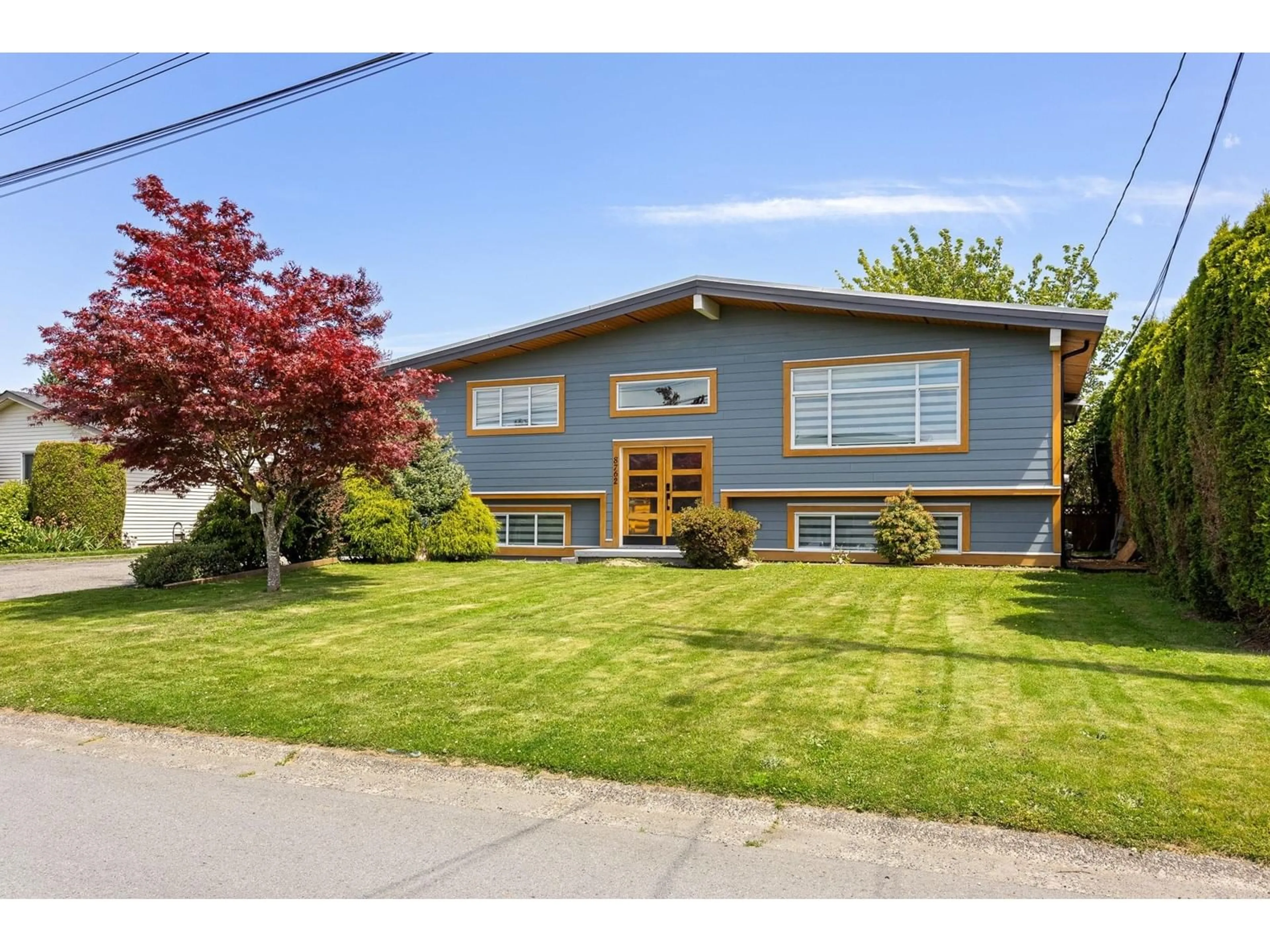 Home with vinyl exterior material, street for 8762 BUTCHART STREET, Chilliwack British Columbia V2P5S3