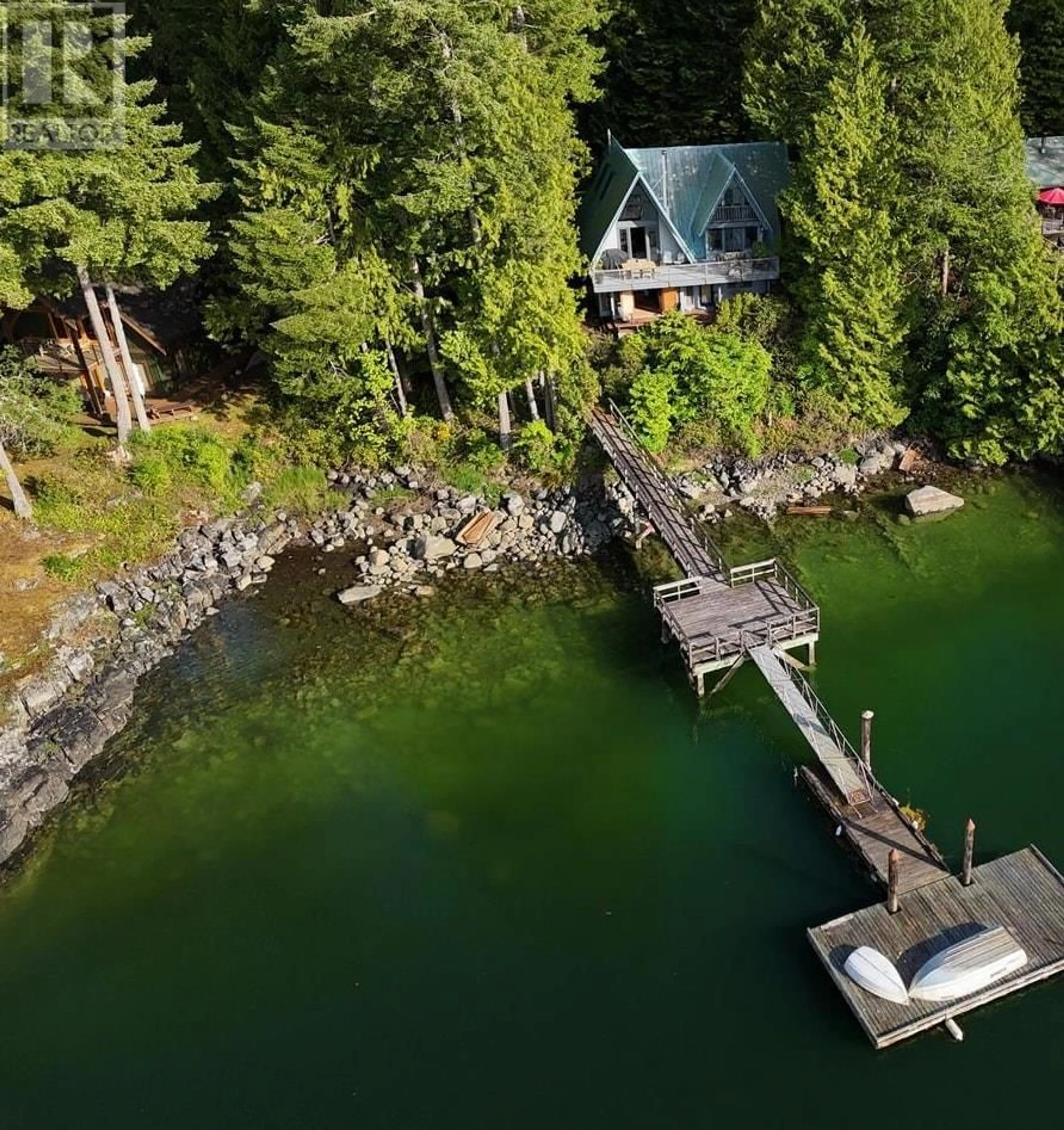 A pic from outside/outdoor area/front of a property/back of a property/a pic from drone, water/lake/river/ocean view for 10061 WESCAN ROAD, Halfmoon Bay British Columbia V7Z1G4