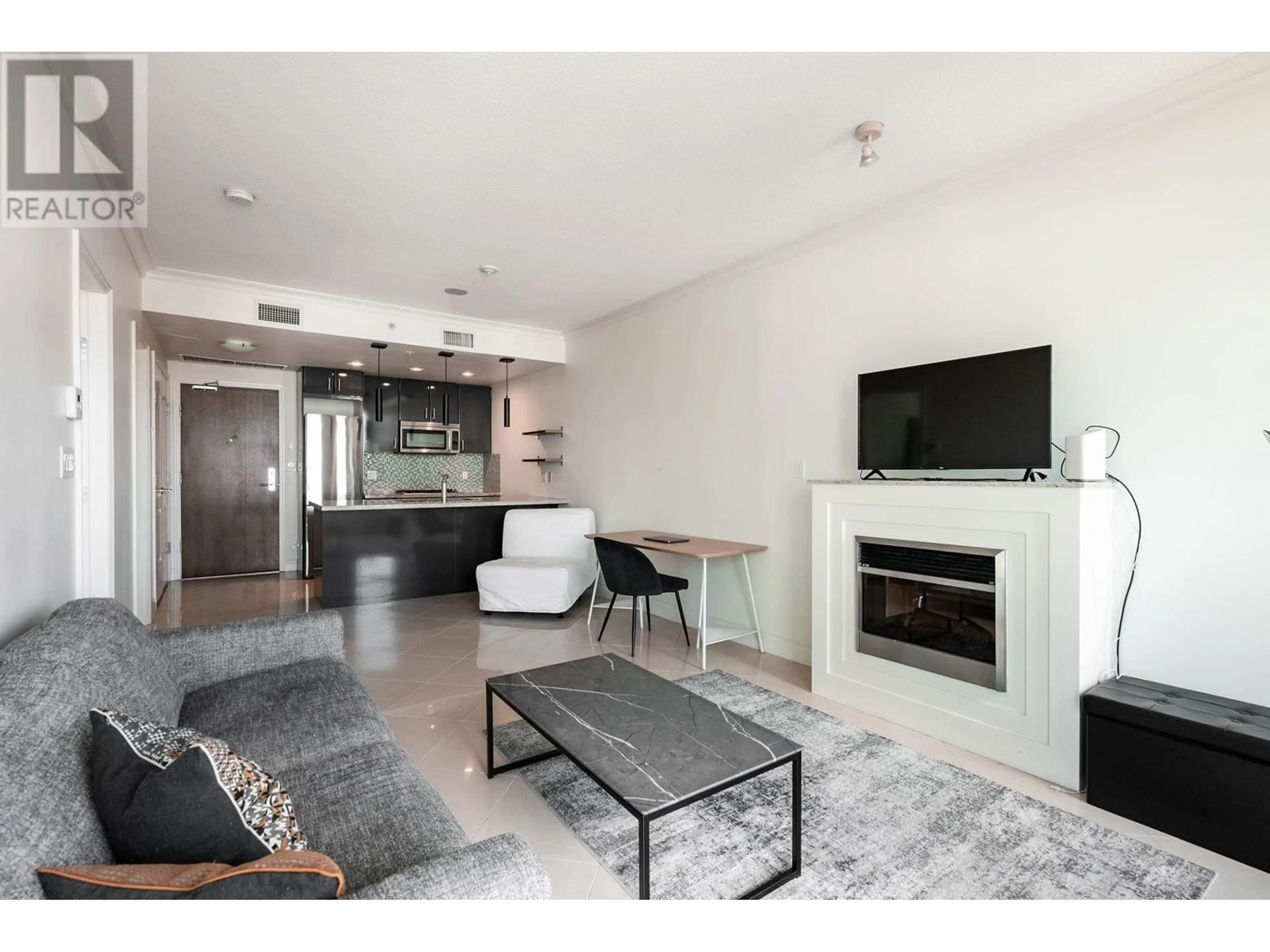Living room with furniture, unknown for 707 - 162 VICTORY SHIP WAY, North Vancouver British Columbia V7L0B4