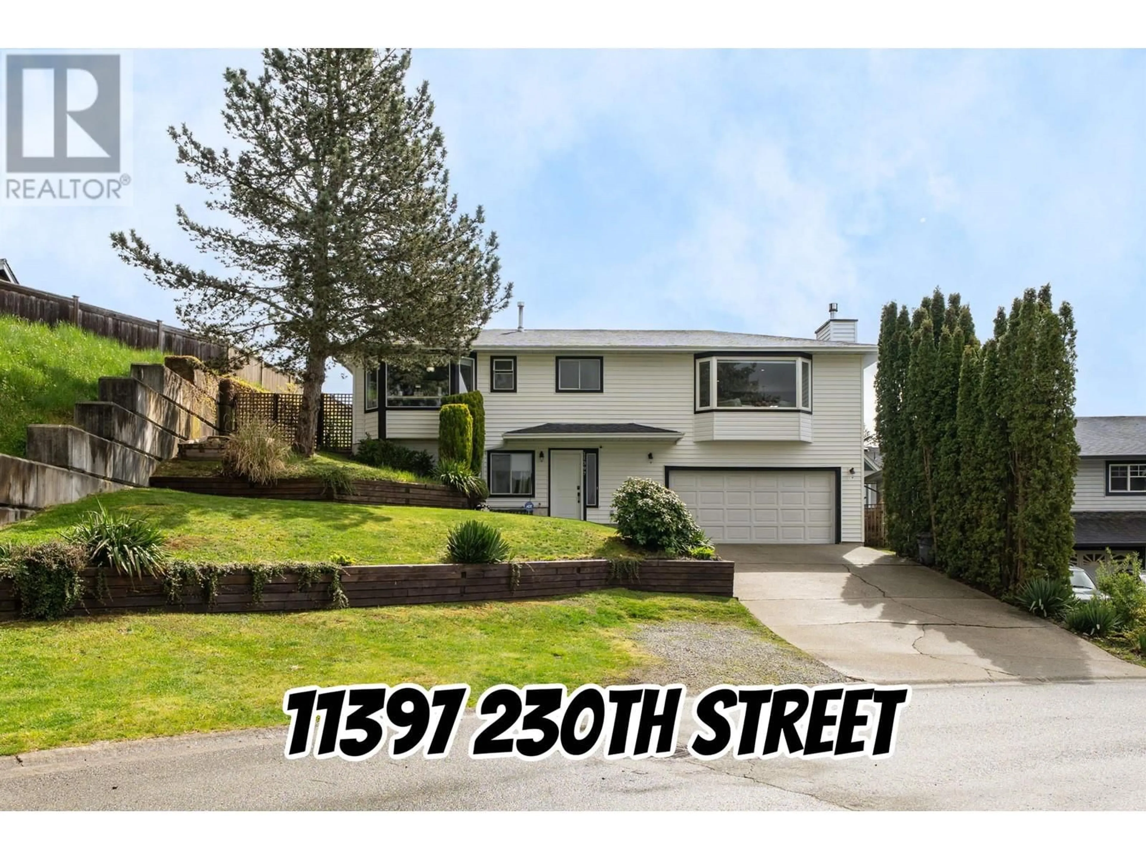 Home with vinyl exterior material, street for 11397 230 STREET, Maple Ridge British Columbia V2X0E9