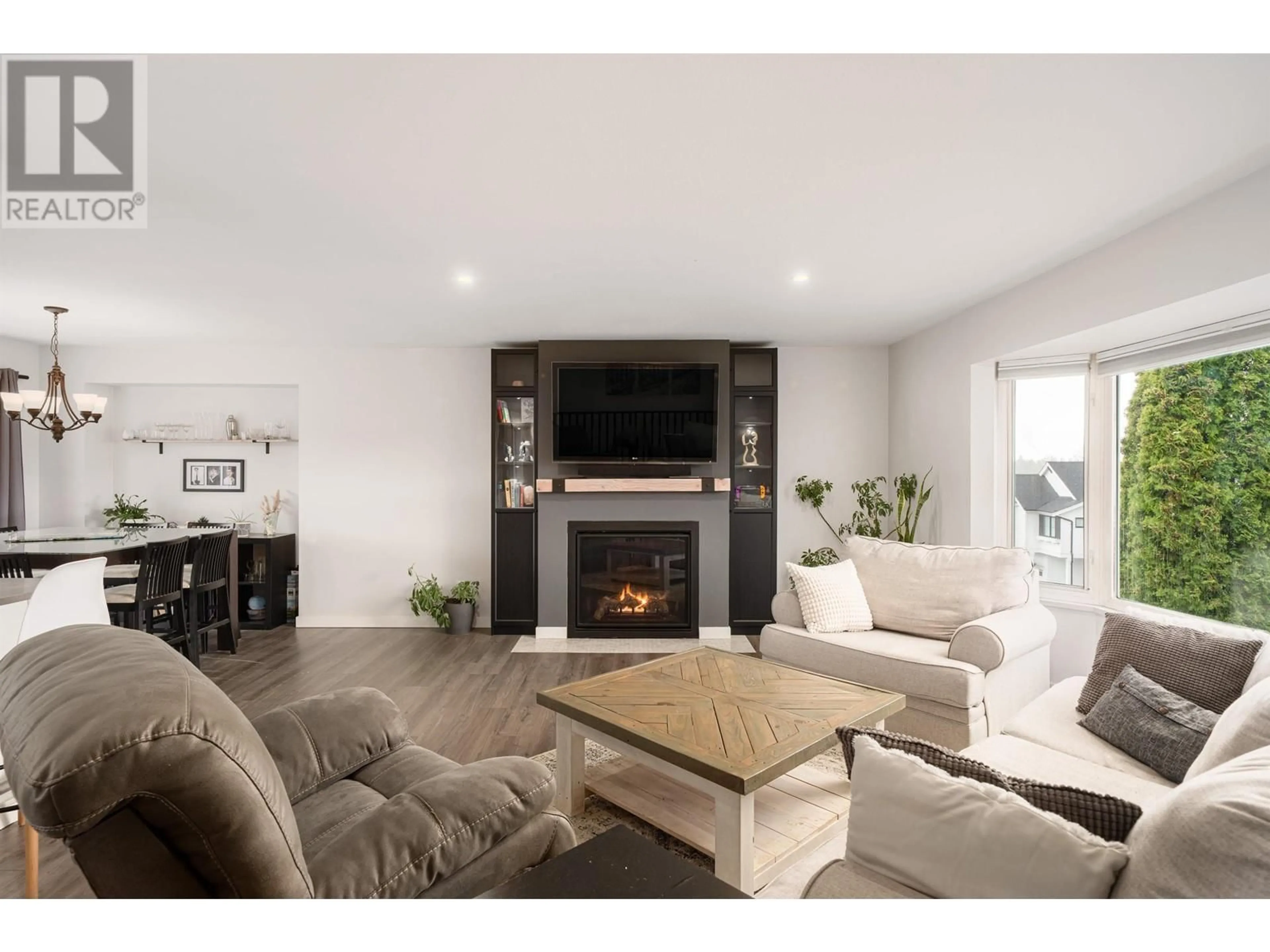 Living room with furniture, wood/laminate floor for 11397 230 STREET, Maple Ridge British Columbia V2X0E9