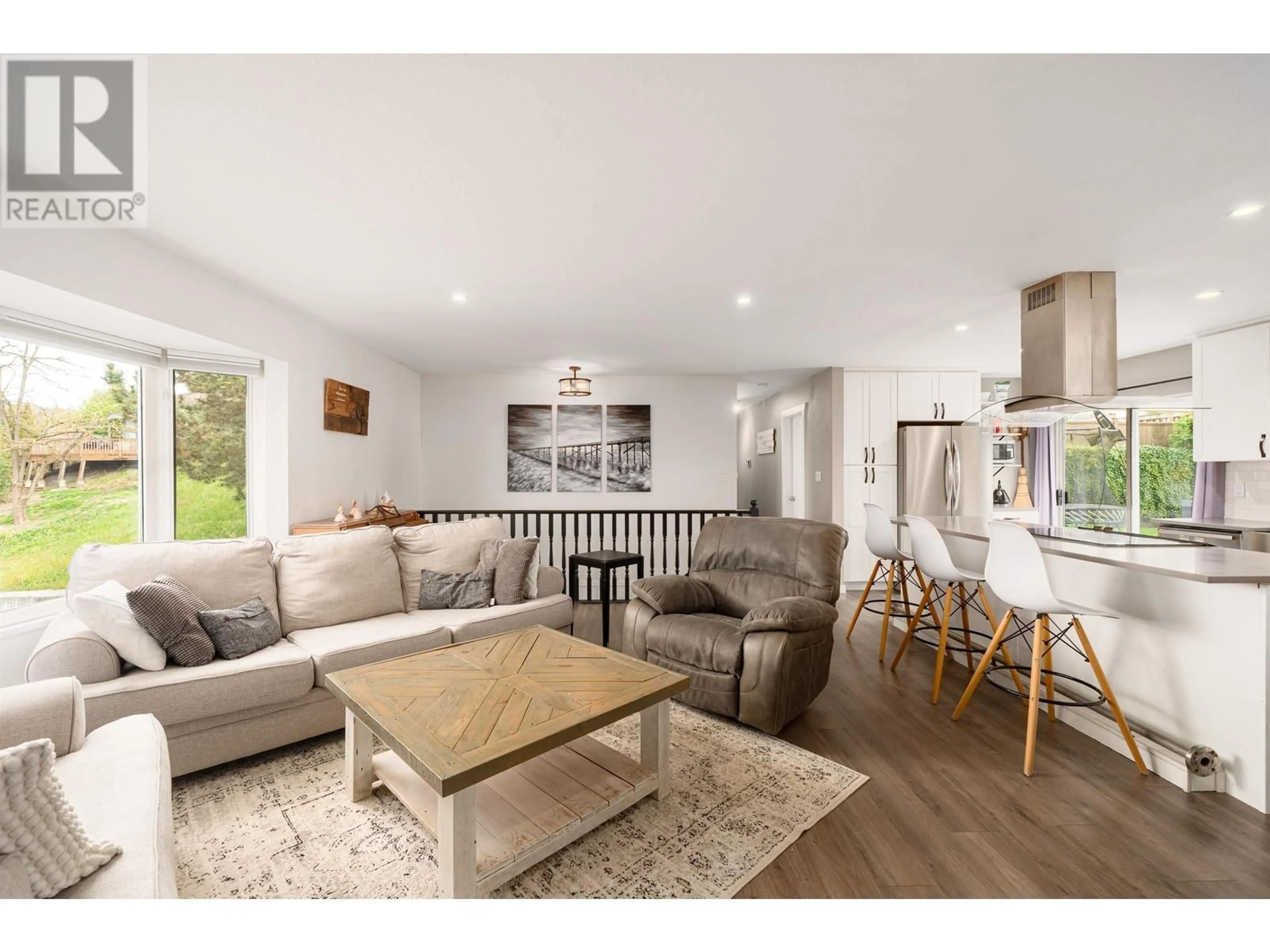 Open concept kitchen, wood/laminate floor for 11397 230 STREET, Maple Ridge British Columbia V2X0E9