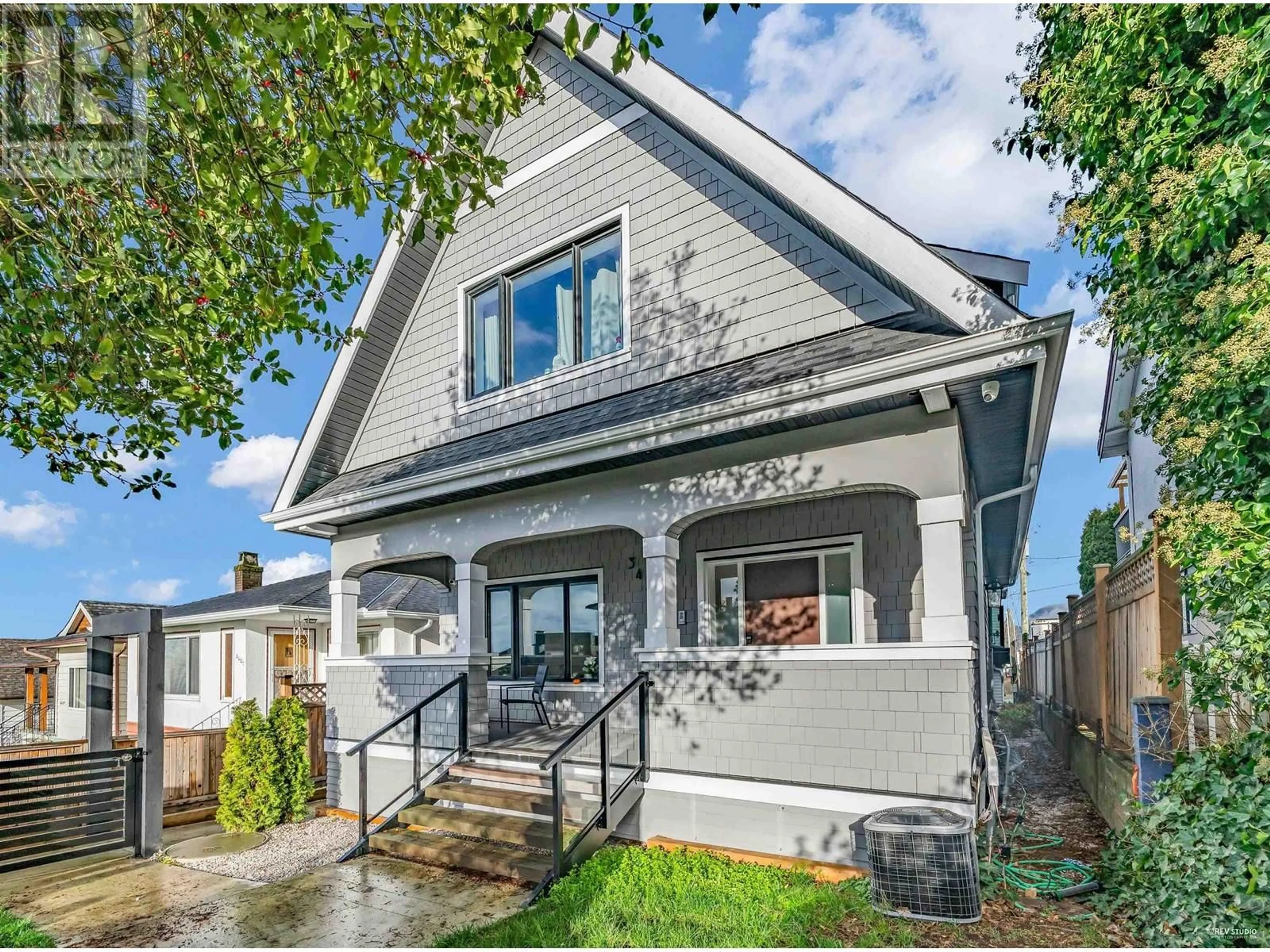 Home with brick exterior material, street for 3433 DUNDAS STREET, Vancouver British Columbia V5K1R9